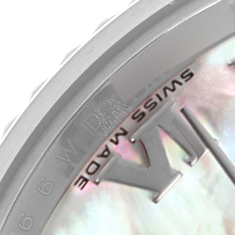 The image shows a close-up of the Rolex Datejust 179174 Women's Stainless Steel Mother of Pearl Dial 179174 Women's Stainless Steel Mother of Pearl Dial's dial edge, highlighting the "SWISS MADE" text and Roman numerals.
