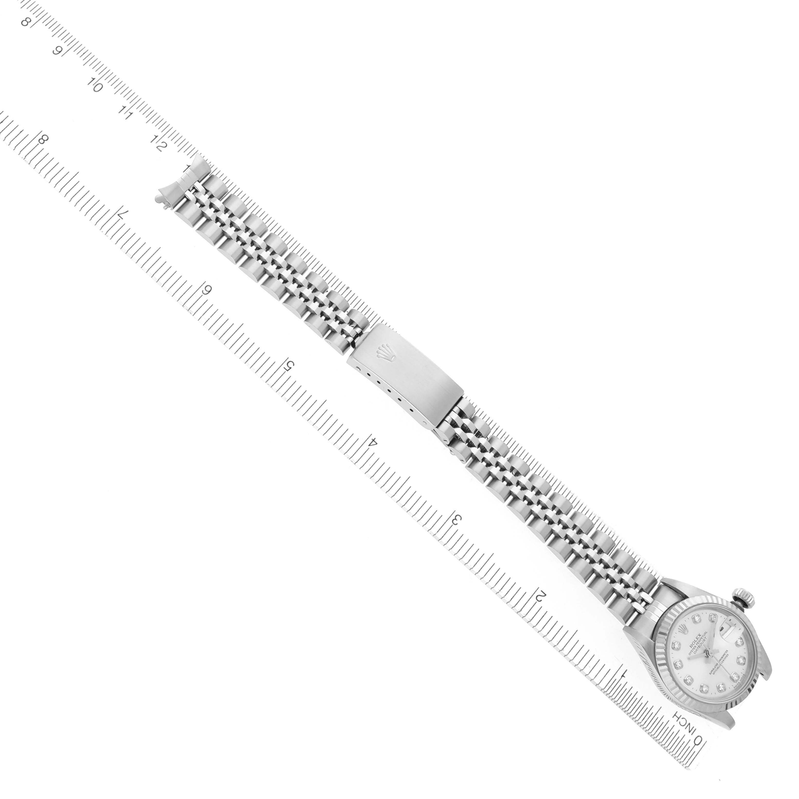 The image shows a Rolex Datejust 69174 Women's Stainless Steel Silver Dial 69174 Women's Stainless Steel Silver Dial watch laid flat, highlighting its bracelet, clasp, and dial at an angled top-down view.