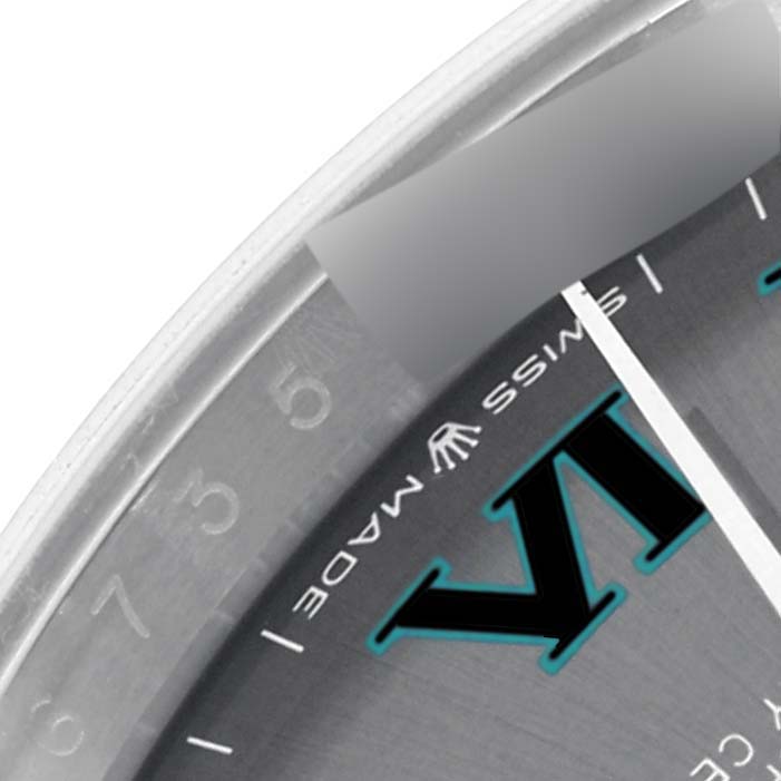 The image shows a close-up of the Rolex Datejust 126234 Men's Stainless Steel Grey Dial 126234 Men's Stainless Steel Grey Dial watch dial, highlighting the bezel, part of the "SWISS MADE" text, and hour markers.