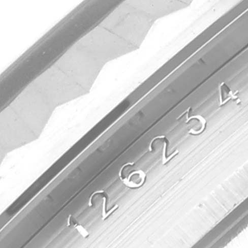 The image shows a close-up of the Rolex Datejust 126234 Men's Stainless Steel Grey Dial 126234 Men's Stainless Steel Grey Dial's engraved bezel, highlighting the watch's model number.