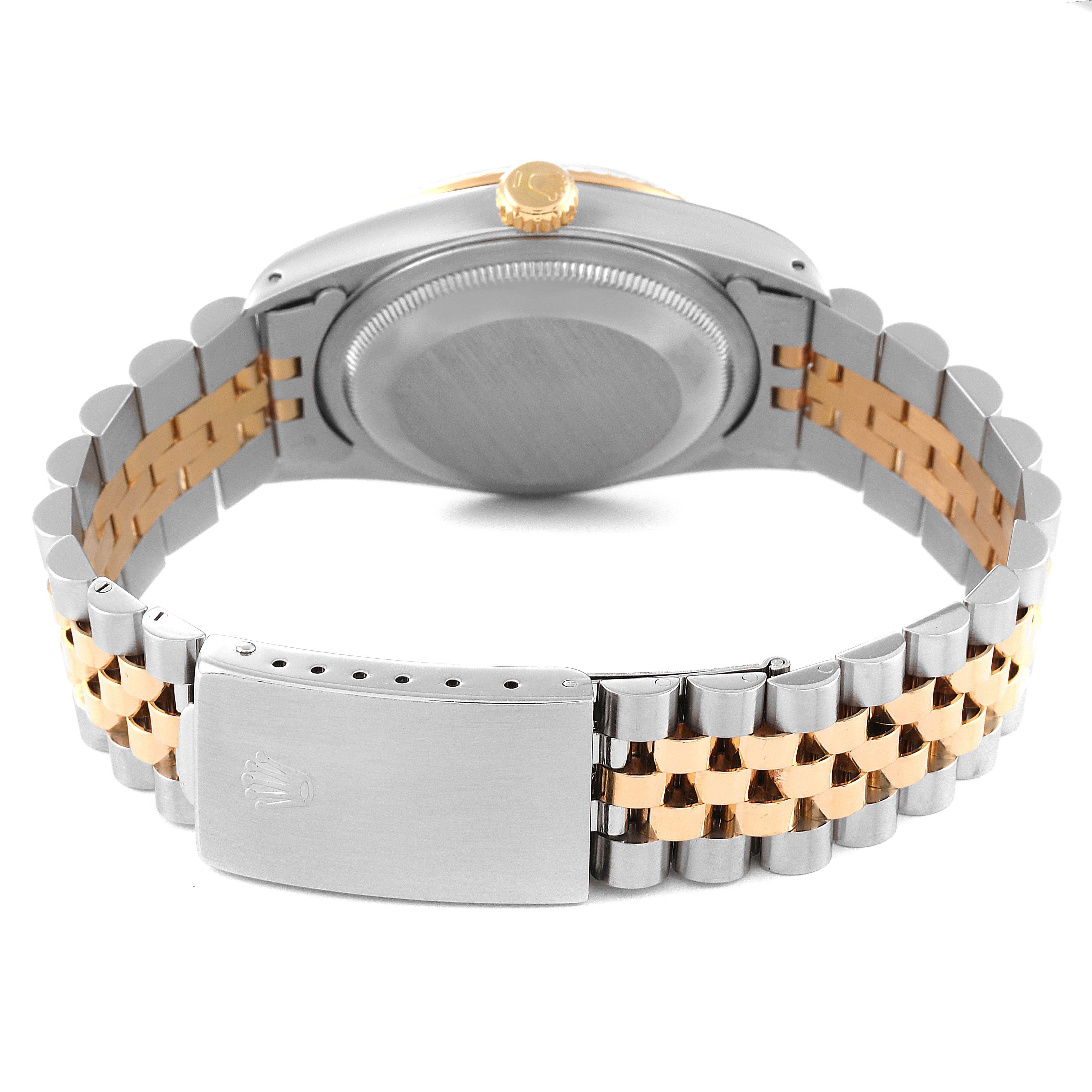 The image shows the bracelet, clasp, case back, and crown of a Rolex Datejust 16233 Men's Steel and Gold (two tone) Blue Dial 16233 Men's Steel and Gold (two tone) Blue Dial watch from a rear view angle.