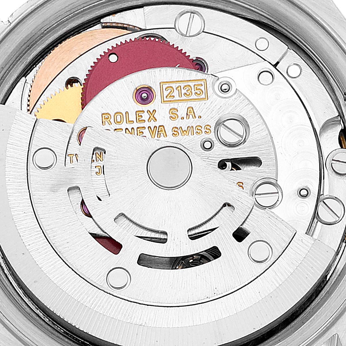 This image shows the movement mechanism of a Rolex Datejust 69173 Women's Steel and Gold (two tone) Champagne Dial 69173 Women's Steel and Gold (two tone) Champagne Dial watch, including gears and engravings.