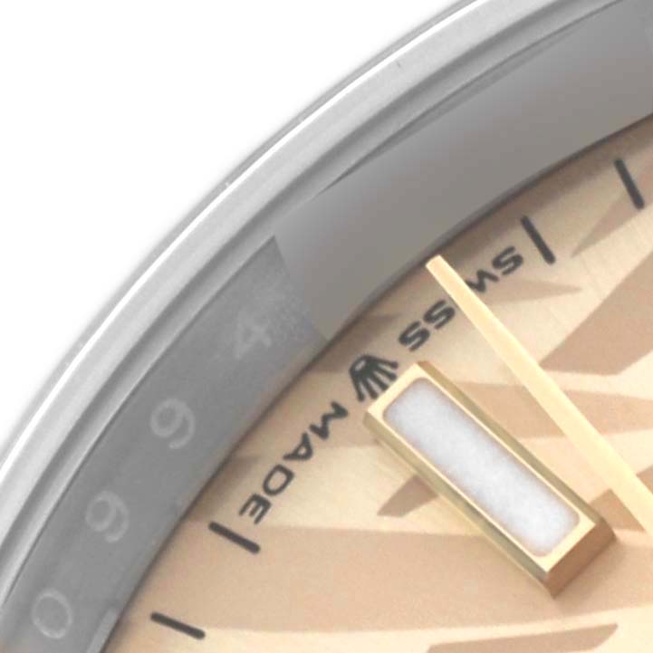 The image shows a close-up of the Rolex Datejust 126233 Men's Steel and Gold (two tone) Champagne Dial 126233 Men's Steel and Gold (two tone) Champagne Dial watch face, highlighting the dial, hour markers, and part of the bezel.