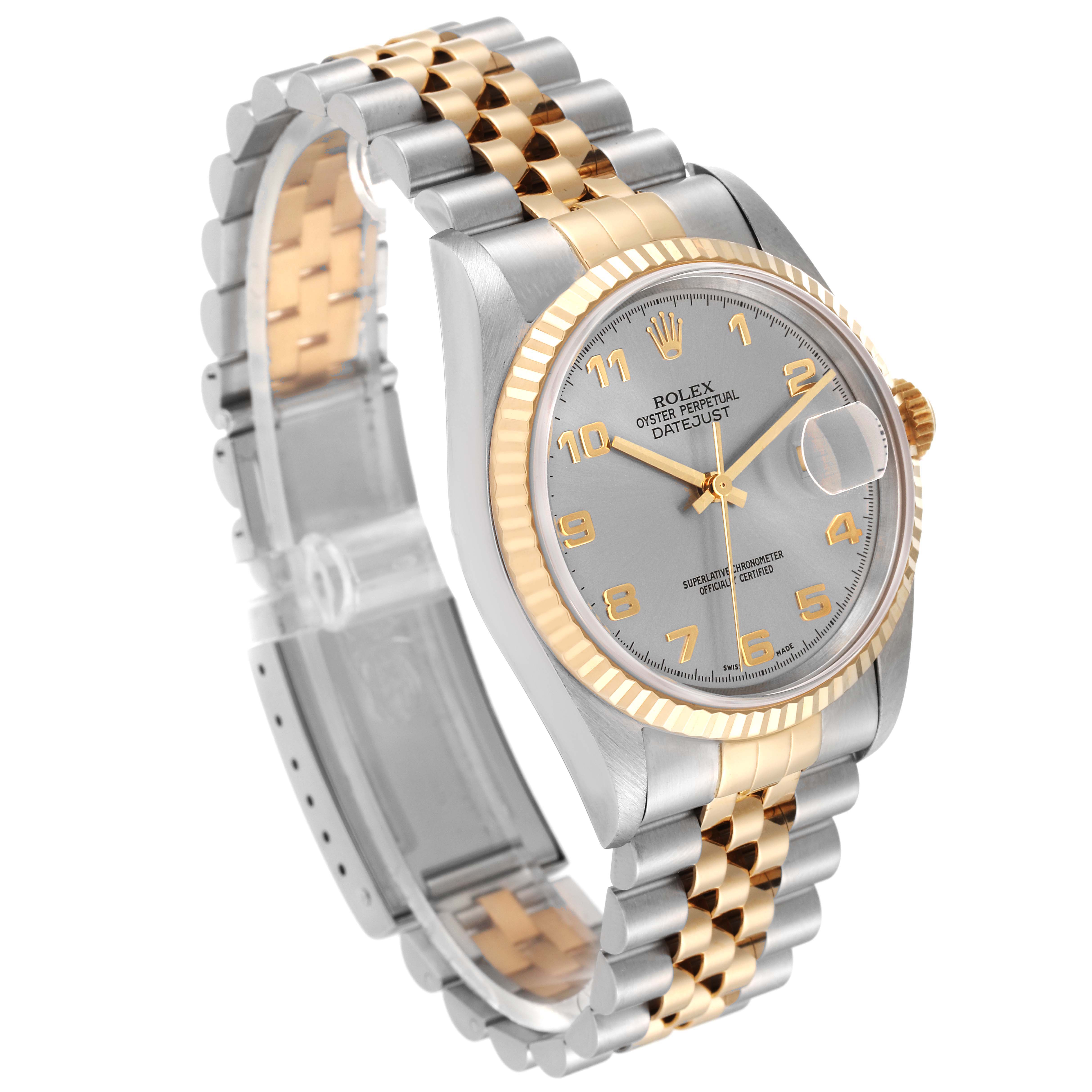 The Rolex Datejust 16233 Men's Steel and Gold (two tone) Silver Dial 16233 Men's Steel and Gold (two tone) Silver Dial watch is shown at an angled view, displaying its face, two-tone bracelet, and fluted bezel.