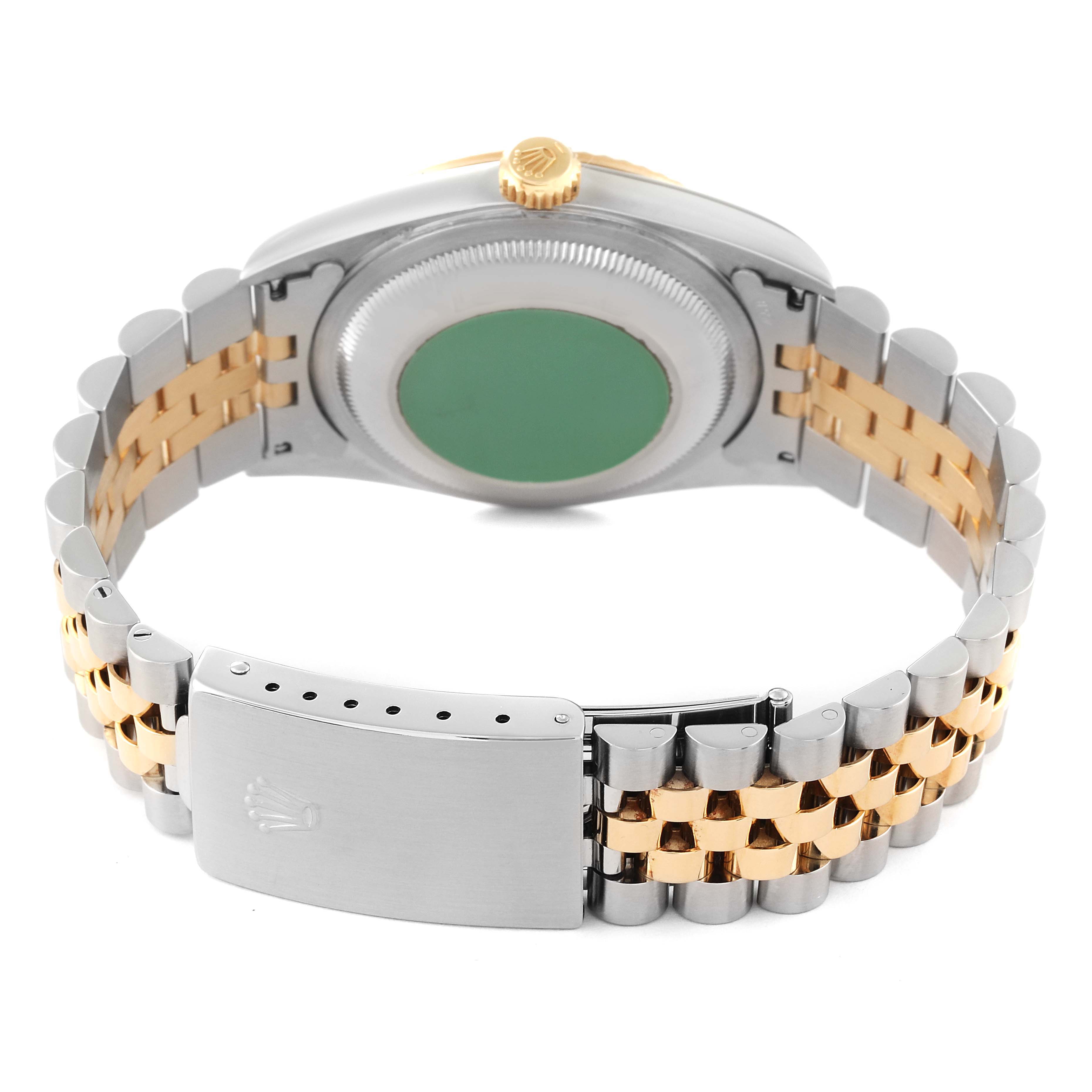 This is a rear angle shot of the Rolex Datejust 16233 Men's Steel and Gold (two tone) Silver Dial 16233 Men's Steel and Gold (two tone) Silver Dial watch, showing the case back, bracelet, and clasp.