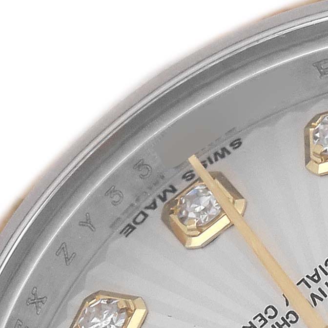 The image shows a close-up of the Rolex Datejust 179173 Women's Stainless Steel Silver Dial watch dial, highlighting diamond hour markers and part of the minute hand.
