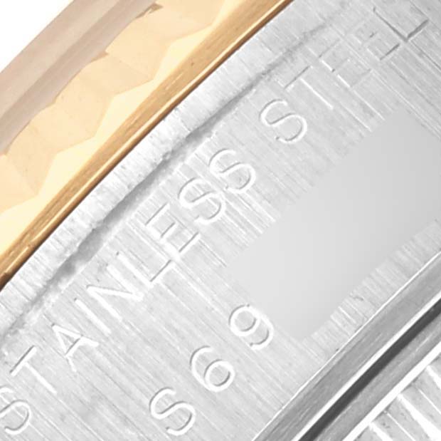 The image shows a close-up of the stainless steel and gold bezel of a Rolex Datejust 69173 Women's Steel and Gold (two tone) Champagne Dial 69173 Women's Steel and Gold (two tone) Champagne Dial watch.