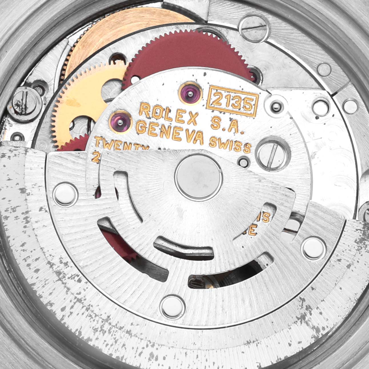 The image shows a close-up of the movement mechanism of a Rolex Datejust 69173 Women's Steel and Gold (two tone) Champagne Dial 69173 Women's Steel and Gold (two tone) Champagne Dial watch, highlighting the intricate gears and components.