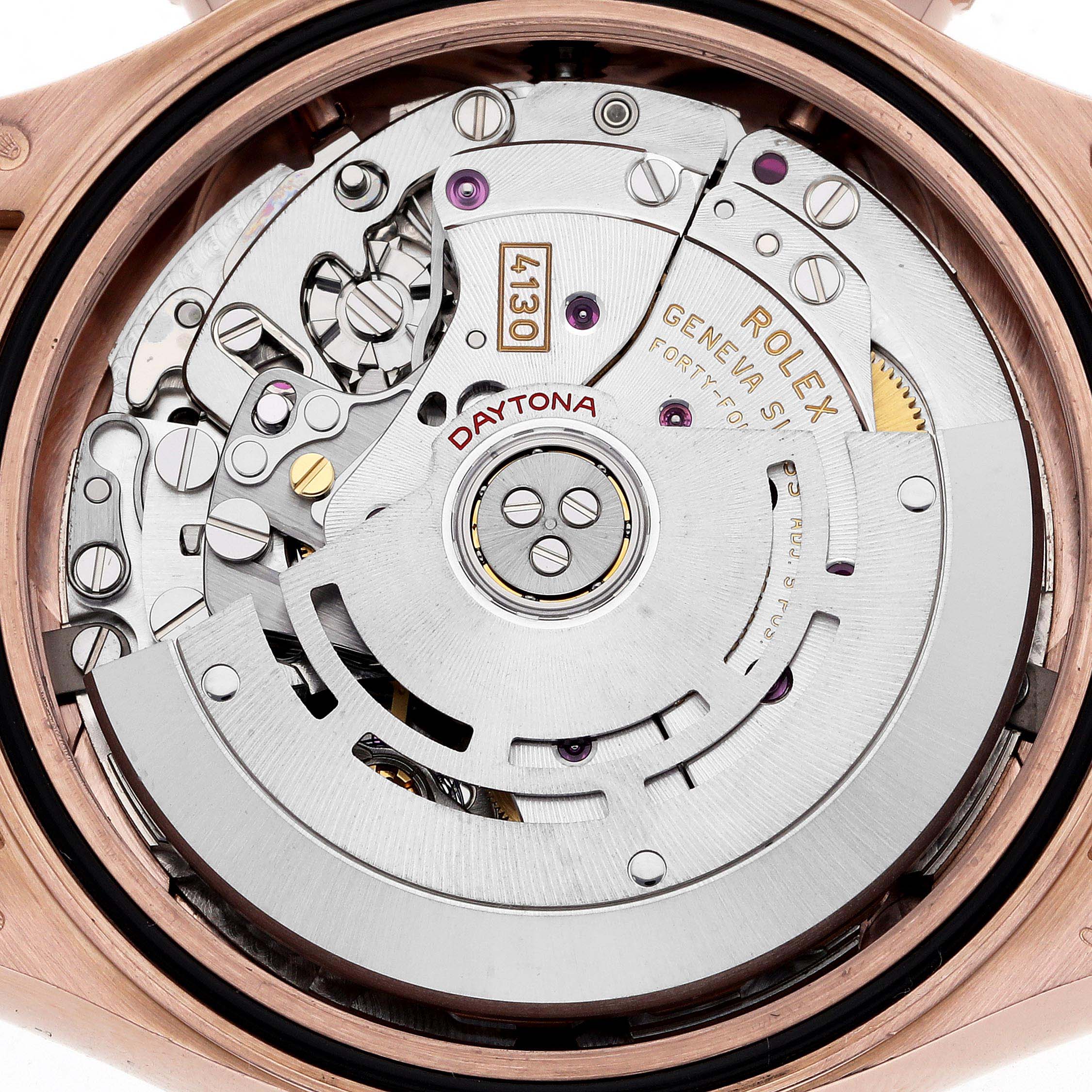 The image shows a close-up of the Rolex Daytona 116515LN Men's Rose Gold Black Dial 116515LN Men's Rose Gold Black Dial watch movement from the back, highlighting its intricate mechanical parts.