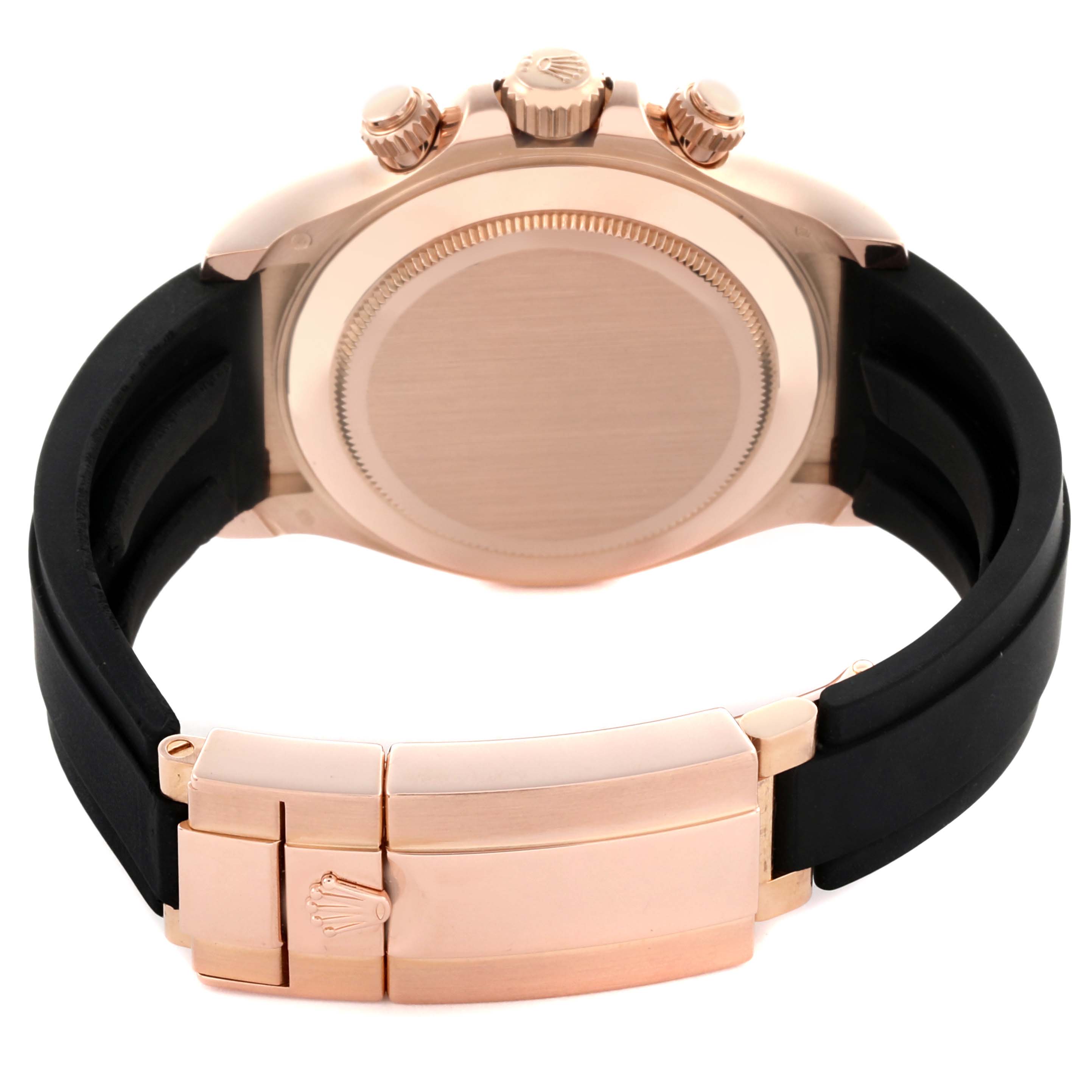 The image shows the back and clasp of a Rolex Daytona 116515LN Men's Rose Gold Black Dial 116515LN Men's Rose Gold Black Dial with a gold case and black strap, highlighting its design details.