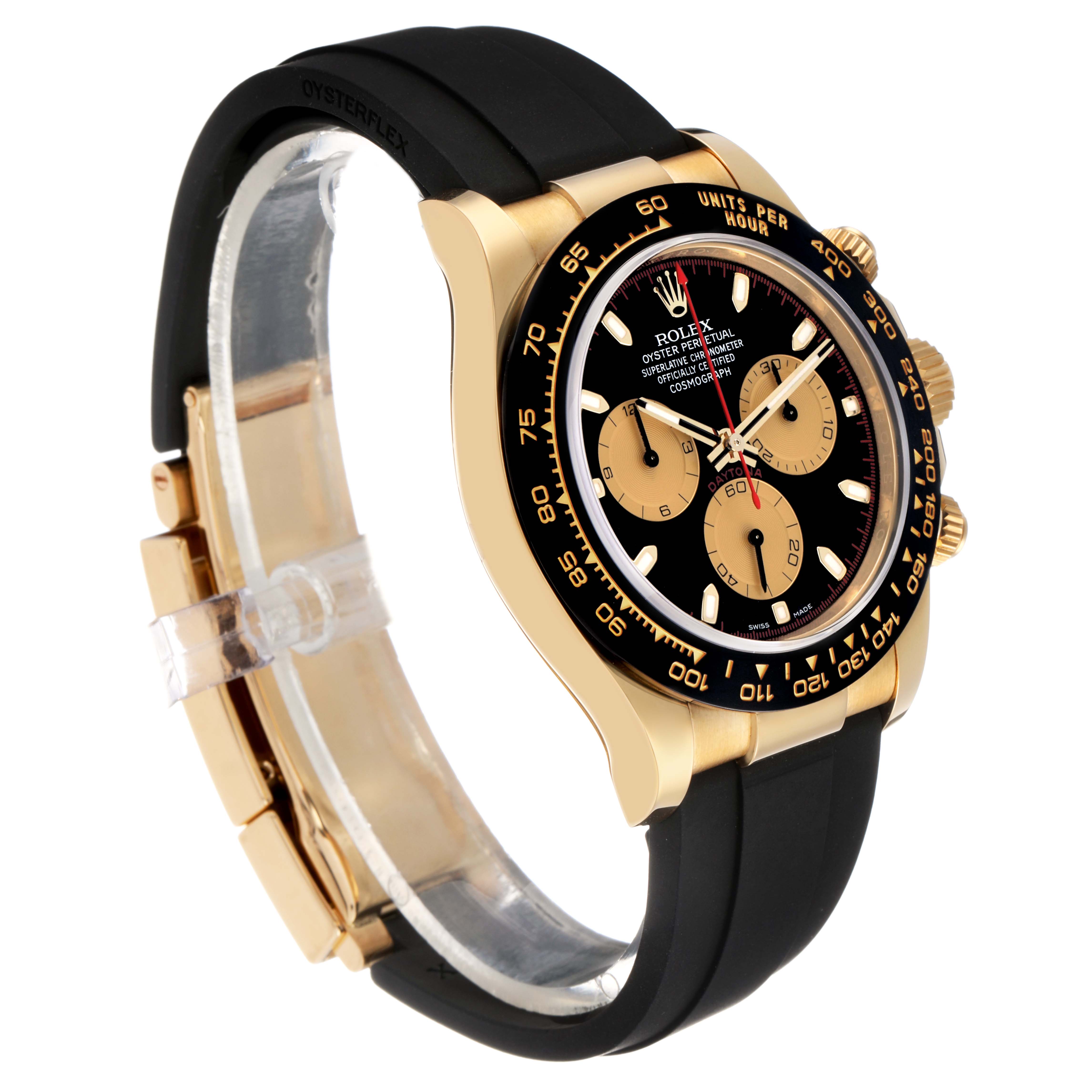 The Rolex Daytona 116518 Men's Yellow Gold Black Dial watch is shown at a three-quarter angle, displaying its face, bezel, pushers, and rubber strap.