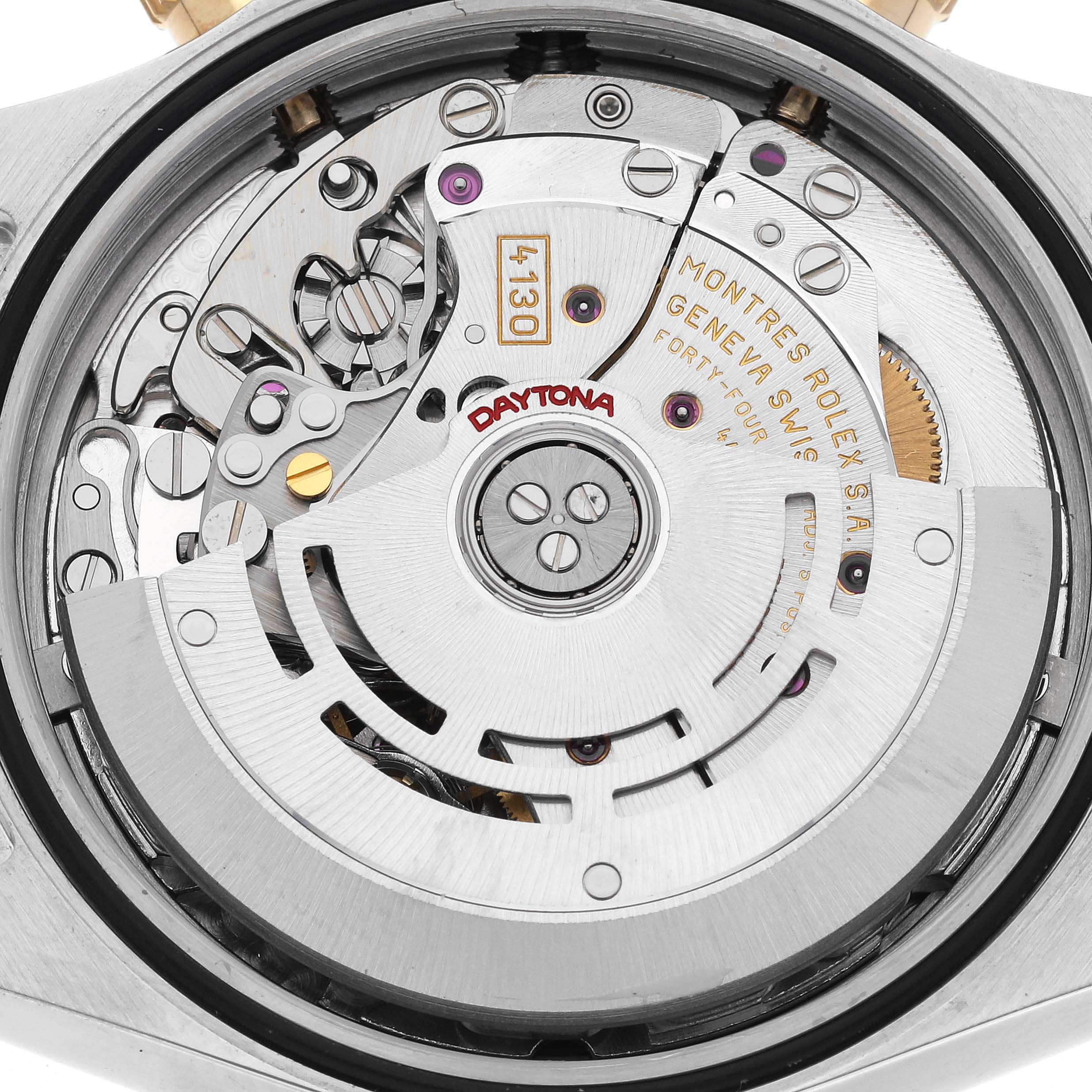 The image shows a close-up view of the movement mechanism of a Rolex Daytona 116523 Men's Steel and Gold (two tone) Mother of Pearl Dial 116523 Men's Steel and Gold (two tone) Mother of Pearl Dial watch.