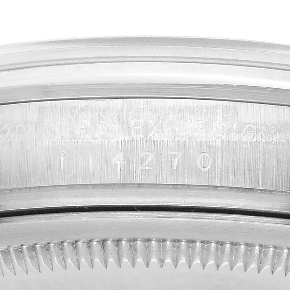 The image shows the side view of the Rolex Explorer 114270 Men's Stainless Steel Black Dial's bezel and case with the model number "114270" engraved.