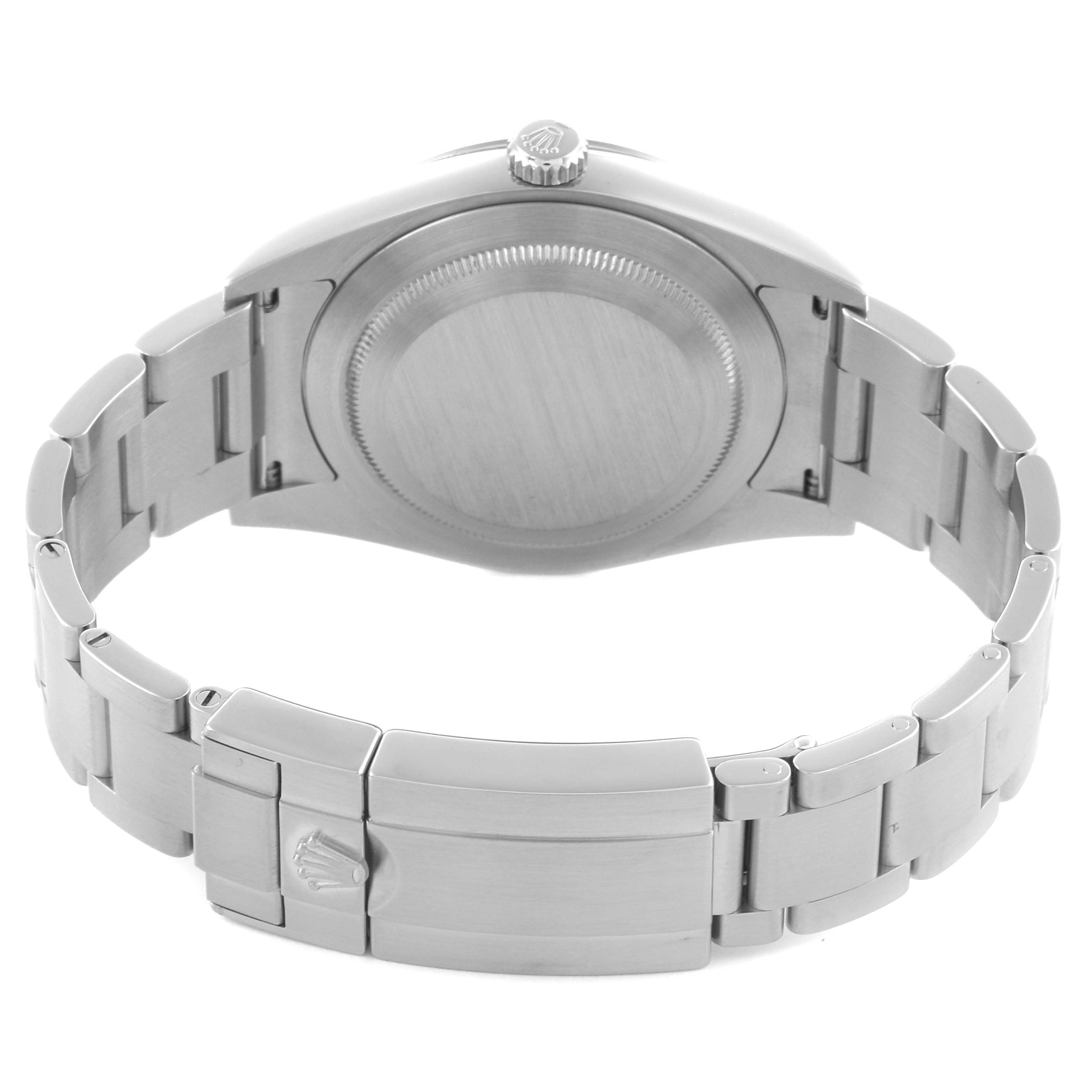 The Rolex Explorer 214270 Men's Stainless Steel Black Dial 214270 Men's Stainless Steel Black Dial watch is shown from the back, highlighting the case back, crown, and metal bracelet with clasp.