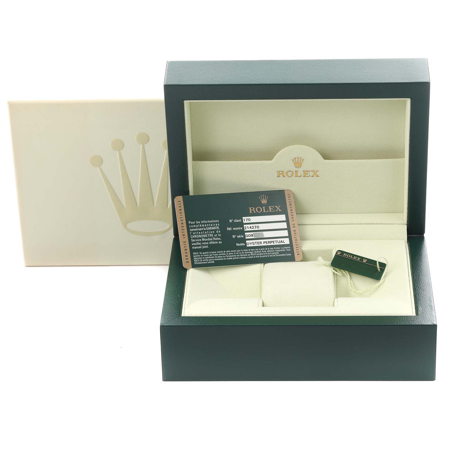 The image shows a Rolex Explorer 214270 Men's Stainless Steel Black Dial 214270 Men's Stainless Steel Black Dial box with an authenticity card and a tag, angled from the front.