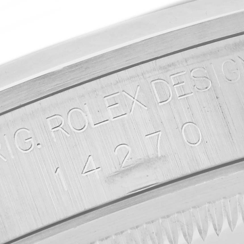 The image shows a close-up of the side of a Rolex Explorer 14270 Men's Stainless Steel Black Dial 14270 Men's Stainless Steel Black Dial, highlighting the engraved model number.