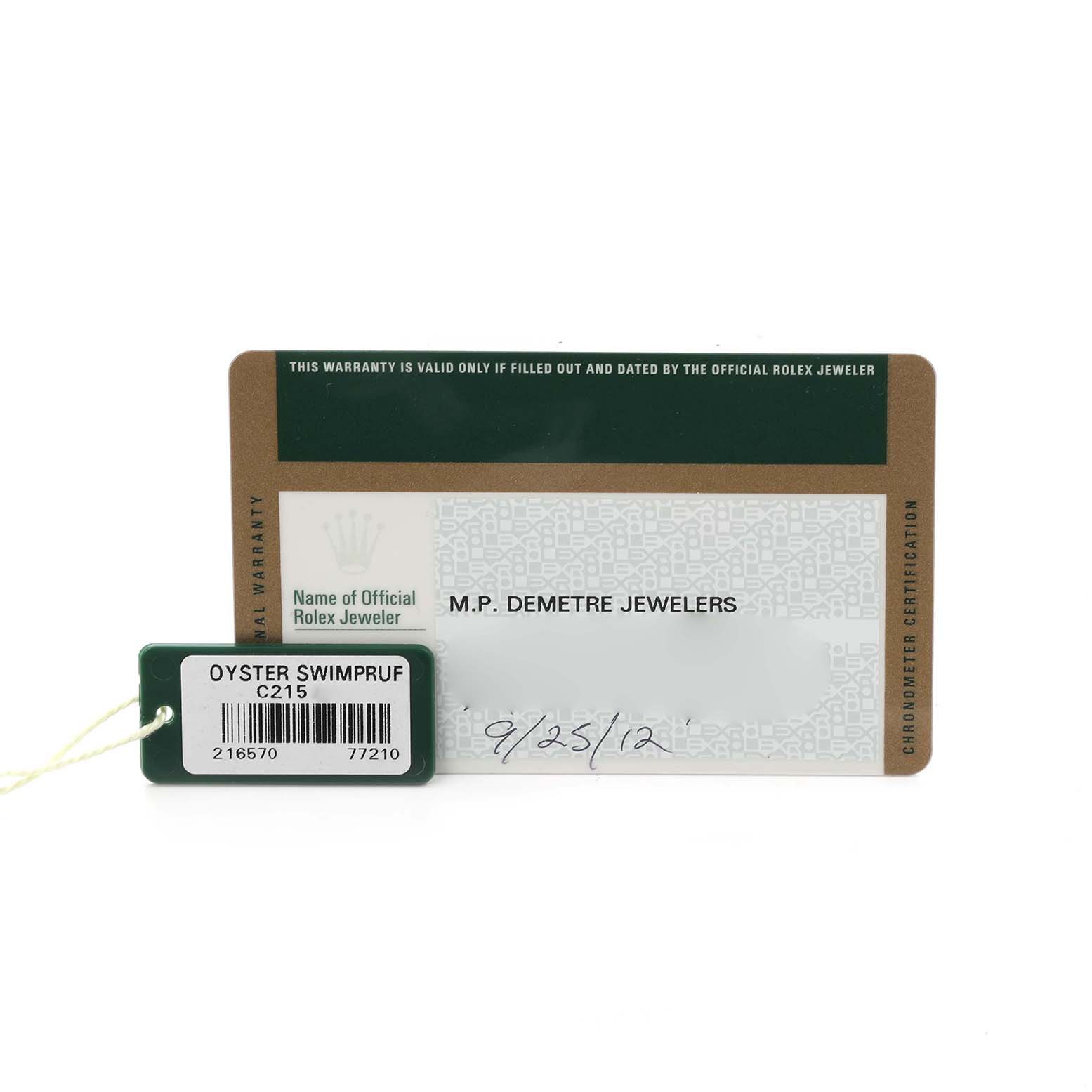 The image shows a warranty card and tag for a Rolex Explorer 216570 Men's Stainless Steel Black Dial 216570 Men's Stainless Steel Black Dial.