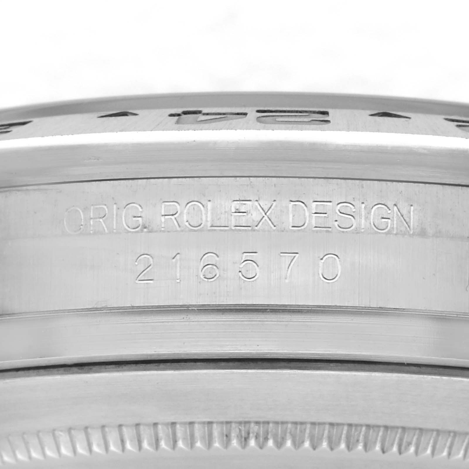The image shows the engraved case side with "ORIG. ROLEX DESIGN" and model number 216570 of the Rolex Explorer 216570 Men's Stainless Steel Black Dial 216570 Men's Stainless Steel Black Dial.