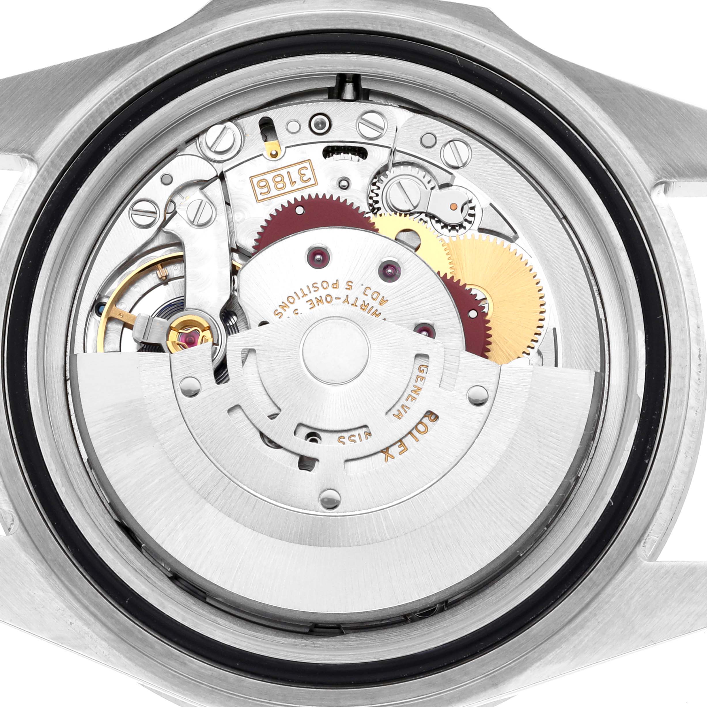 The image shows the movement of a Rolex Explorer 16570T Men's Stainless Steel Black Dial 16570T Men's Stainless Steel Black Dial watch from the rear, highlighting its intricate gears and components.