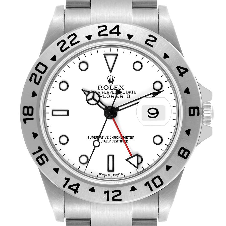 The image shows a Rolex Explorer II watch from a front angle, highlighting the dial, bezel, and date magnifier.