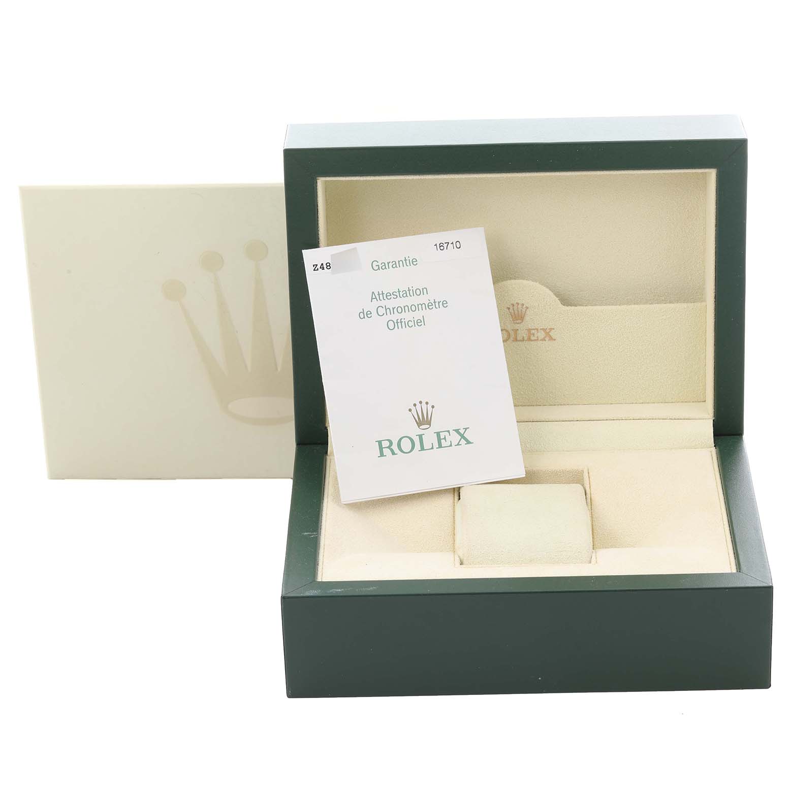 The image shows an empty Rolex GMT-Master 16710 Men's Stainless Steel Black Dial 16710 Men's Stainless Steel Black Dial watch box at an angle, featuring the brand's logo and a certificate card inside.