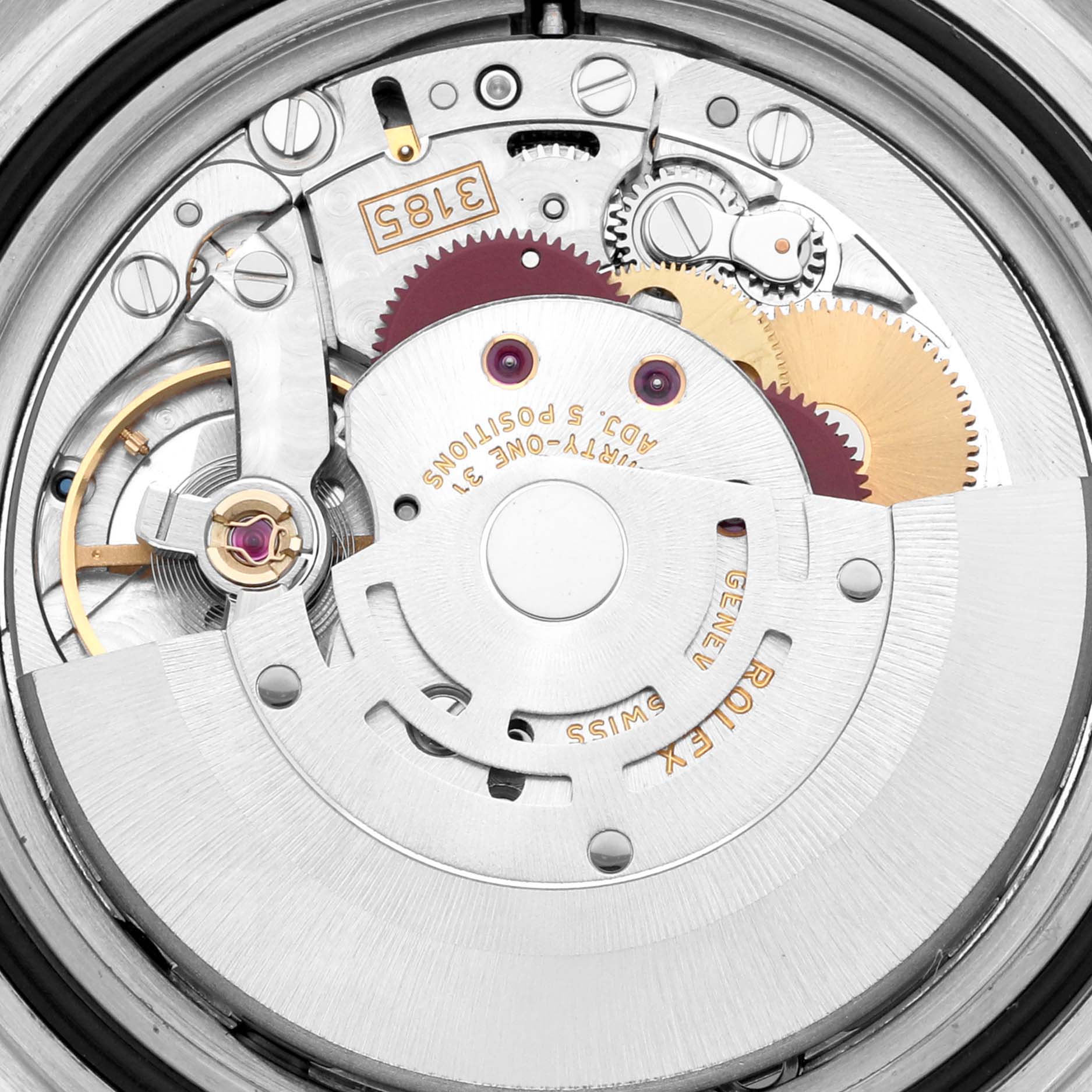 The image shows an internal view of the Rolex GMT-Master 16710 Men's Stainless Steel Black Dial 16710 Men's Stainless Steel Black Dial movement, featuring gears and intricate mechanical components.