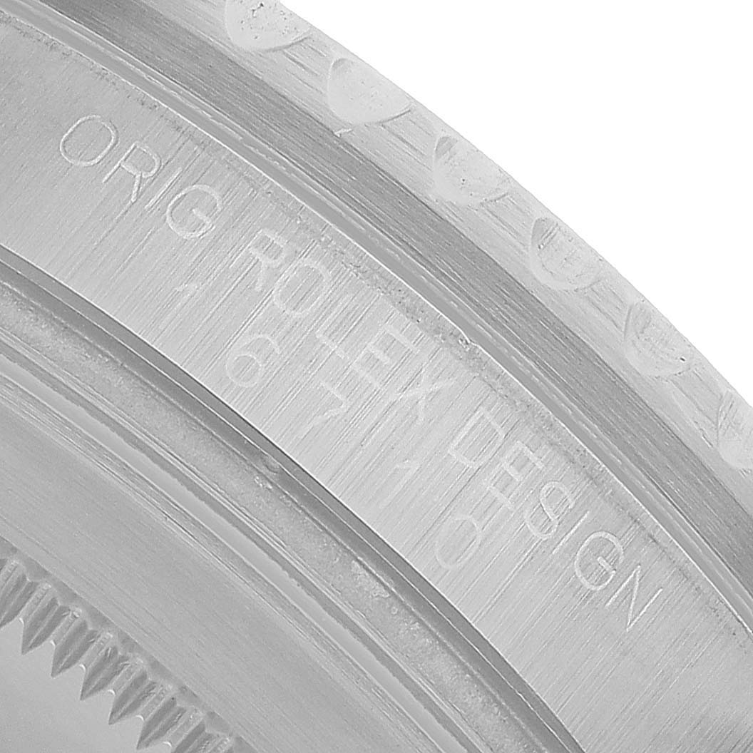 The image shows a close-up of the inner bezel of a Rolex GMT-Master 16710 Men's Stainless Steel Black Dial, highlighting the engraved model details.