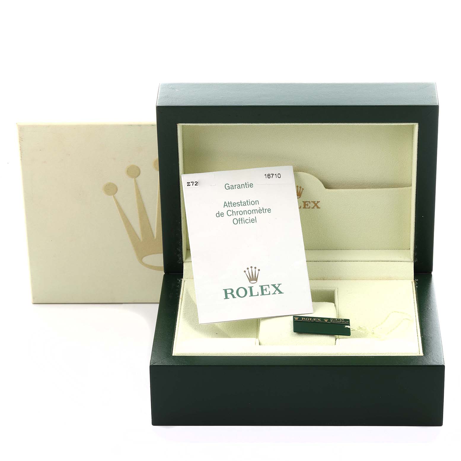 The image shows a Rolex GMT-Master 16710T Men
s Stainless Steel Black Dial 16710T Men
s Stainless Steel Black Dial watch box with paperwork and a tag, viewed from the front.