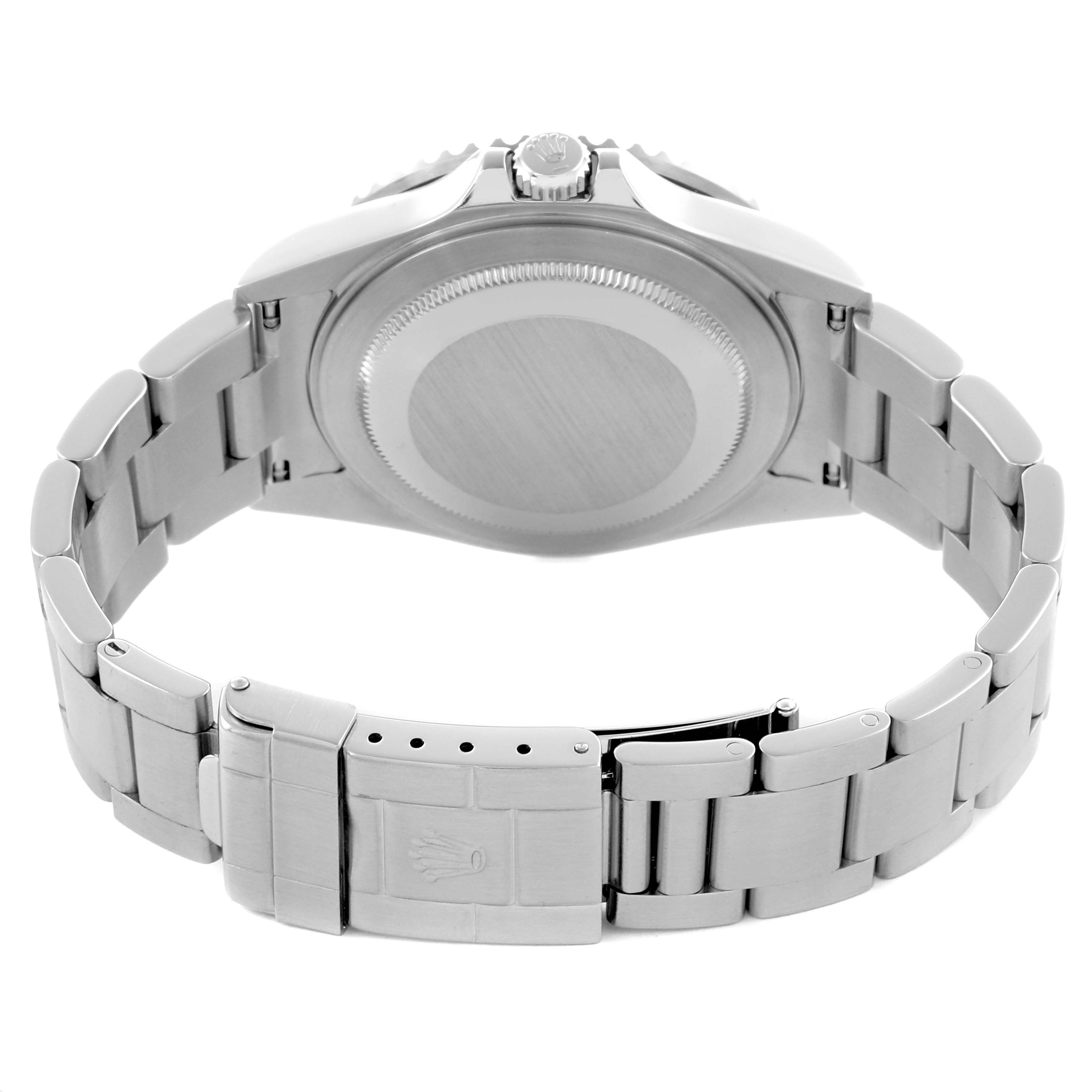 The image shows the back of the Rolex GMT-Master 16710T Men
s Stainless Steel Black Dial 16710T Men
s Stainless Steel Black Dial watch and its metal bracelet from a rear angle.