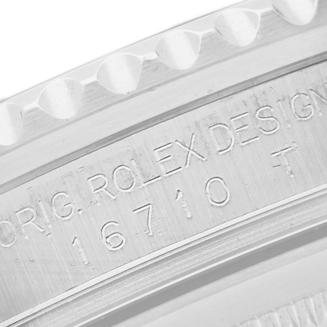 The image shows the side engraving of the bezel and case with model details on the Rolex GMT-Master 16710T Men
s Stainless Steel Black Dial 16710T Men
s Stainless Steel Black Dial.