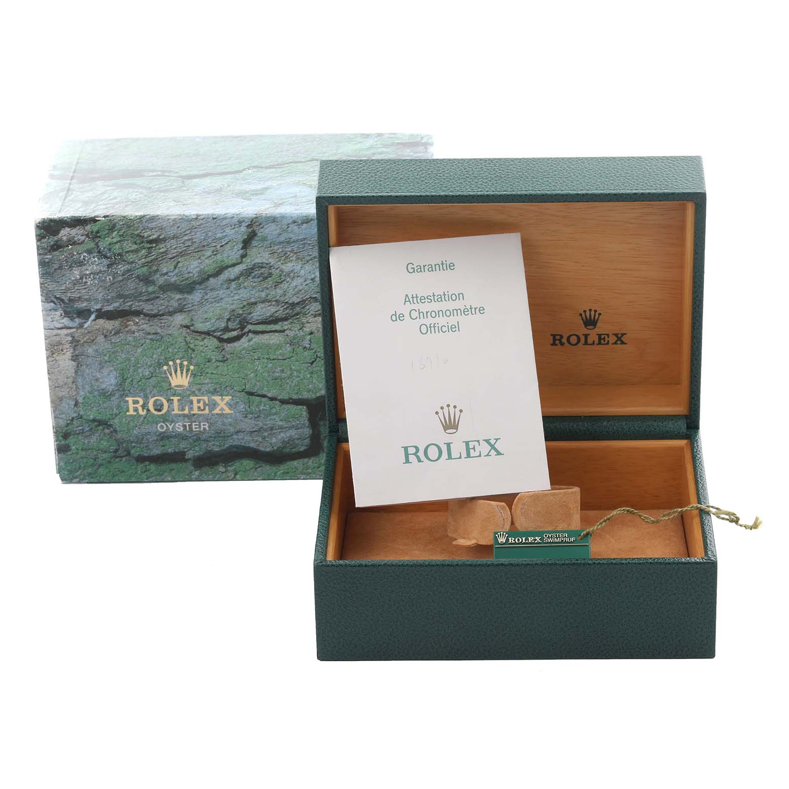 The image shows the packaging and guarantee card for a Rolex GMT-Master 16710 Men
s Stainless Steel Black Dial 16710 Men
s Stainless Steel Black Dial watch.