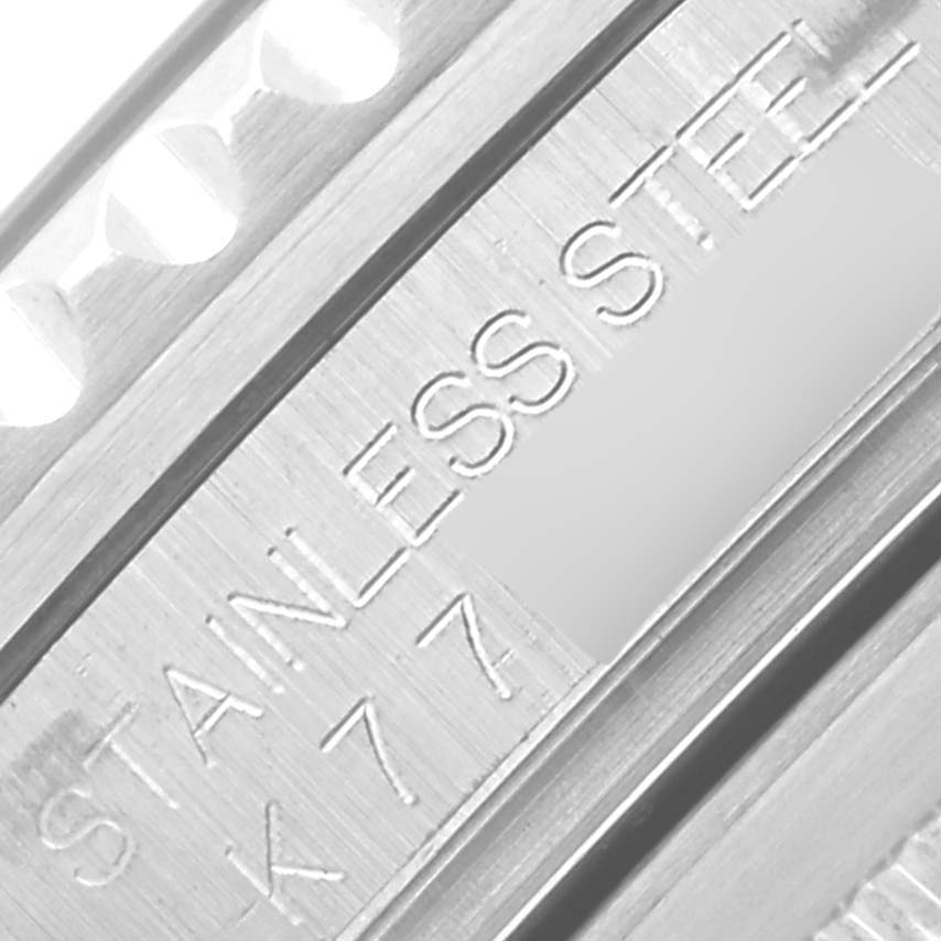 The image shows a close-up of the stainless steel bracelet with engravings on the Rolex GMT-Master 16710 Men
s Stainless Steel Black Dial 16710 Men
s Stainless Steel Black Dial watch.