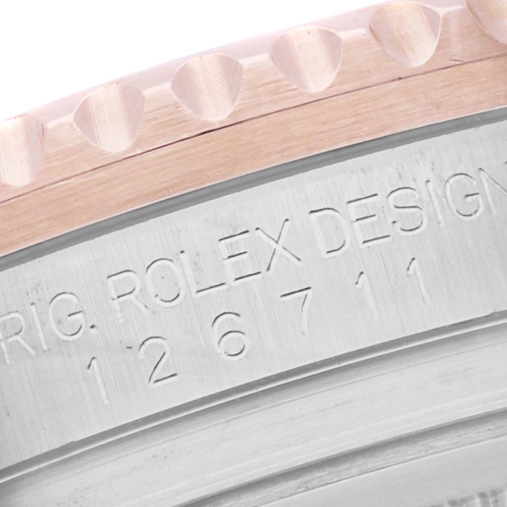 The image shows a close-up of the engraved side of a Rolex GMT-Master 126711 Men's Steel and Gold (two tone) Black Dial 126711 Men's Steel and Gold (two tone) Black Dial, highlighting its model number.