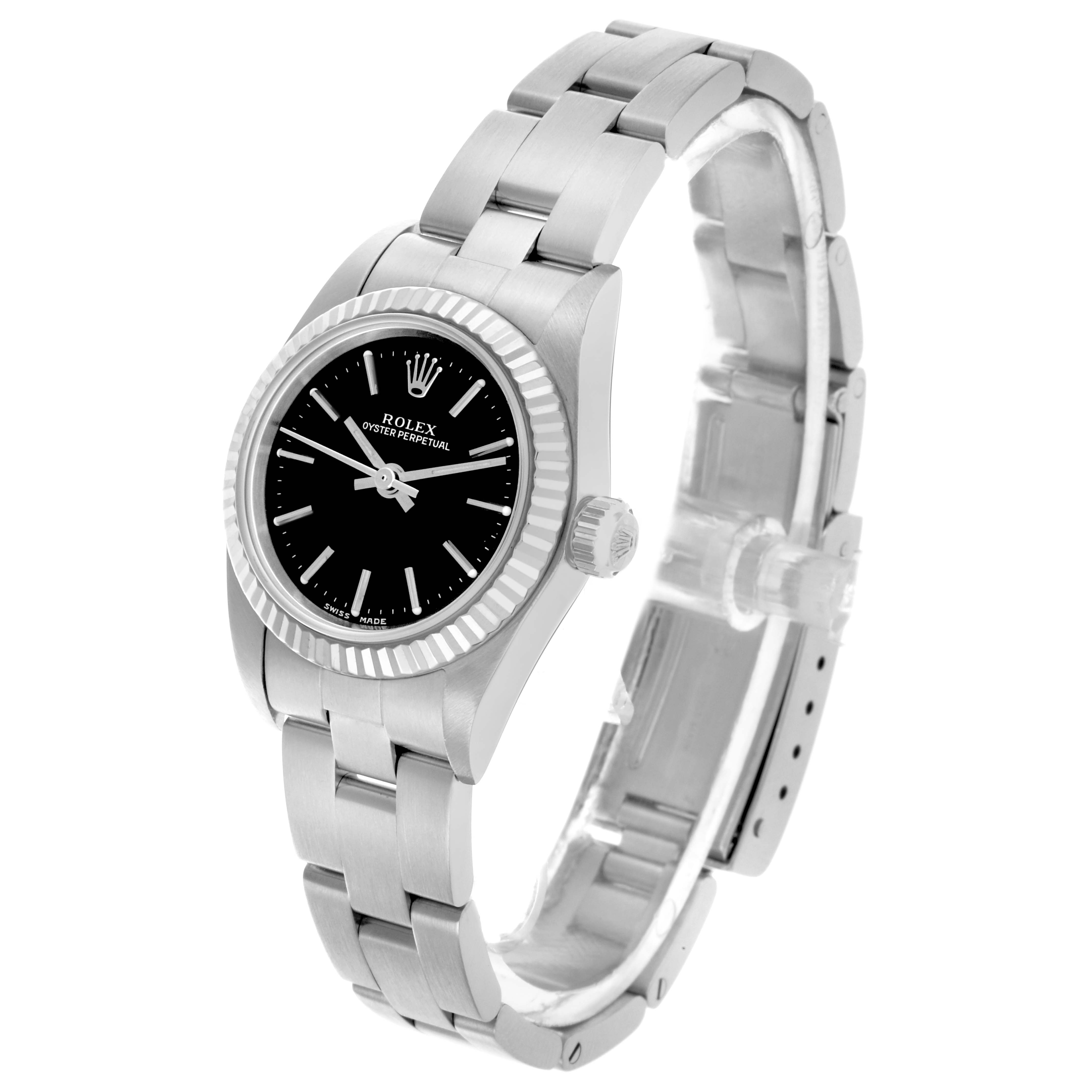 The Rolex Oyster Perpetual 76094 Women's Stainless Steel Black Dial 76094 Women's Stainless Steel Black Dial watch is shown at a tilted angle, displaying the face, crown, bezel, and bracelet.