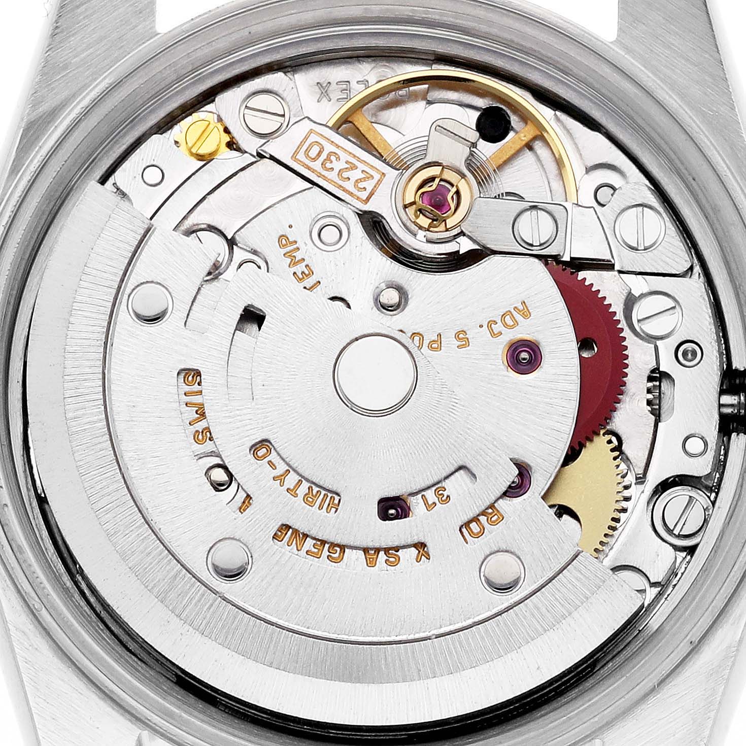 The image shows the inner mechanics of a Rolex Oyster Perpetual 76094 Women's Stainless Steel Black Dial 76094 Women's Stainless Steel Black Dial watch, focusing on the movement's intricate components.