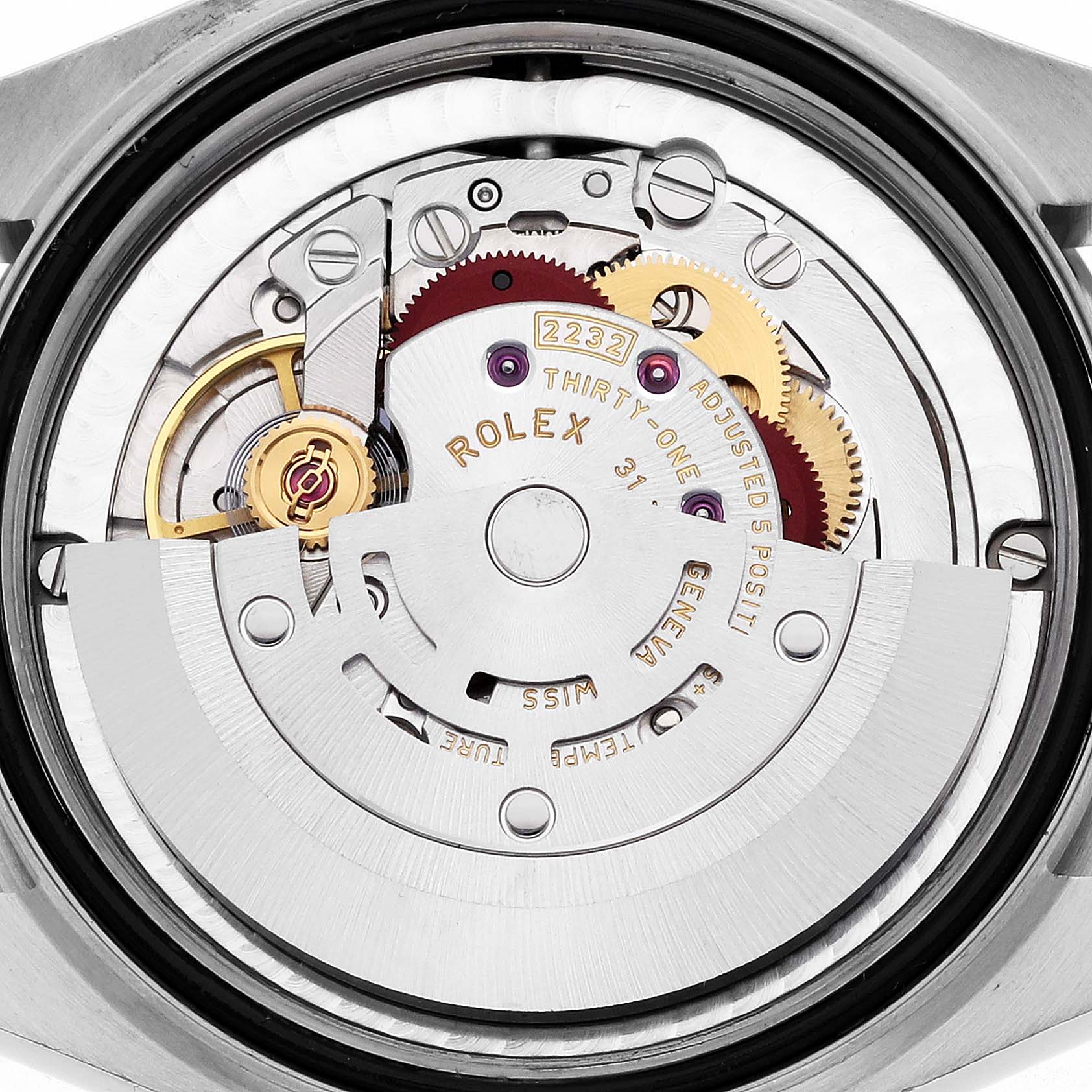 The image shows the internal movement of a mid-size Rolex watch from a top view, highlighting various gears and components.