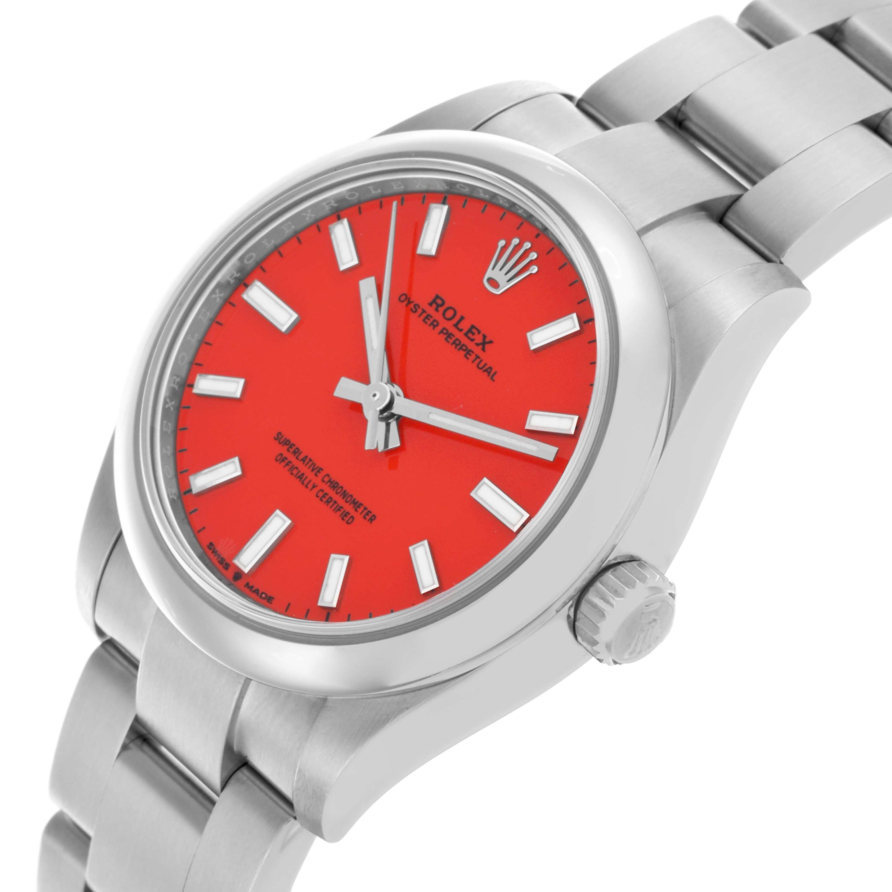 The Rolex Mid-Size 277200 Women's Stainless Steel Red Dial 277200 Women's Stainless Steel Red Dial watch is shown from a three-quarter angle, highlighting the red dial, bezel, crown, and bracelet links.