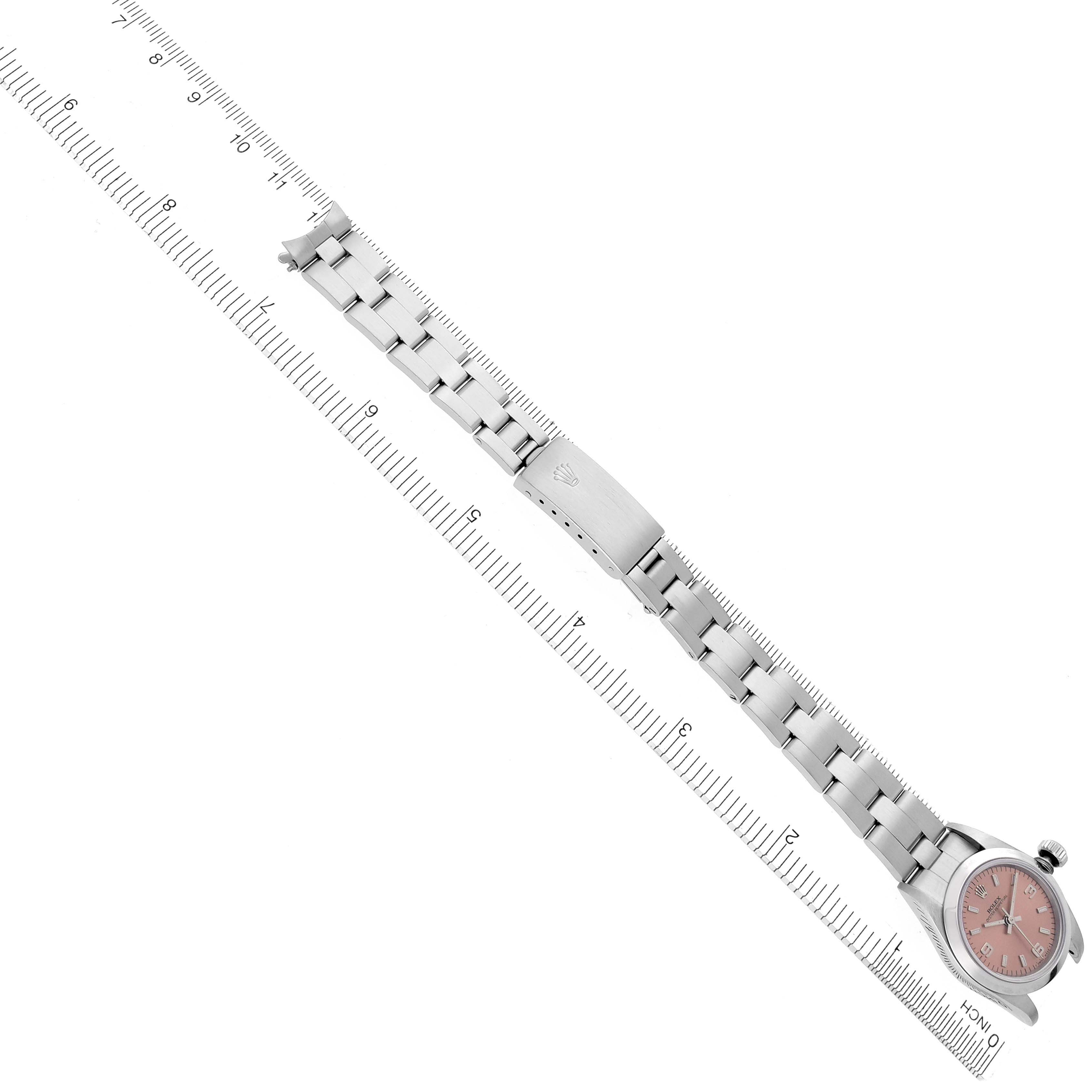 The Rolex Oyster Perpetual 67180 Women's Stainless Steel Pink Dial 67180 Women's Stainless Steel Pink Dial watch is shown diagonally, featuring the bracelet and clasp.