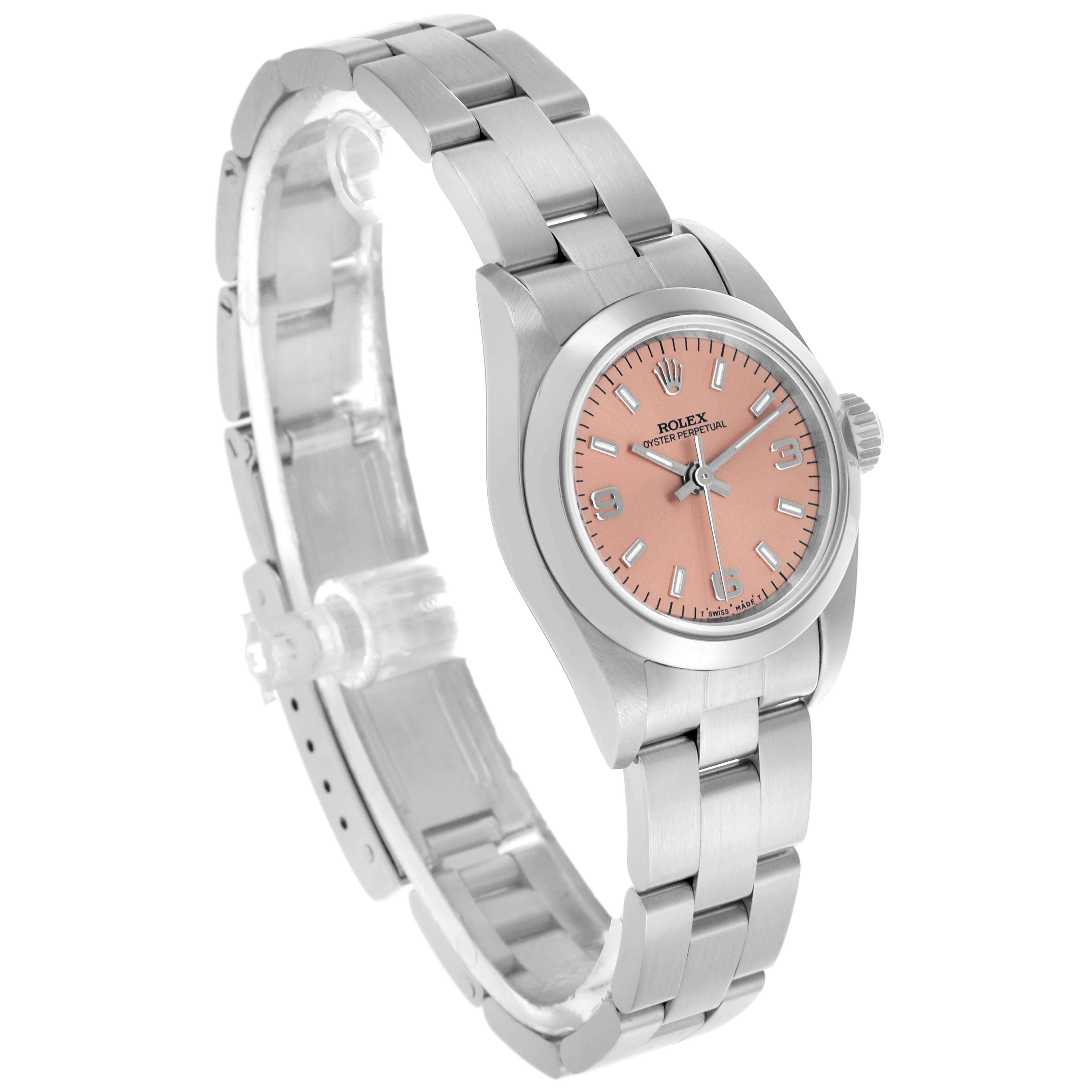 The Rolex Oyster Perpetual 67180 Women's Stainless Steel Pink Dial 67180 Women's Stainless Steel Pink Dial watch is shown at an angle highlighting the face, bezel, crown, and bracelet.