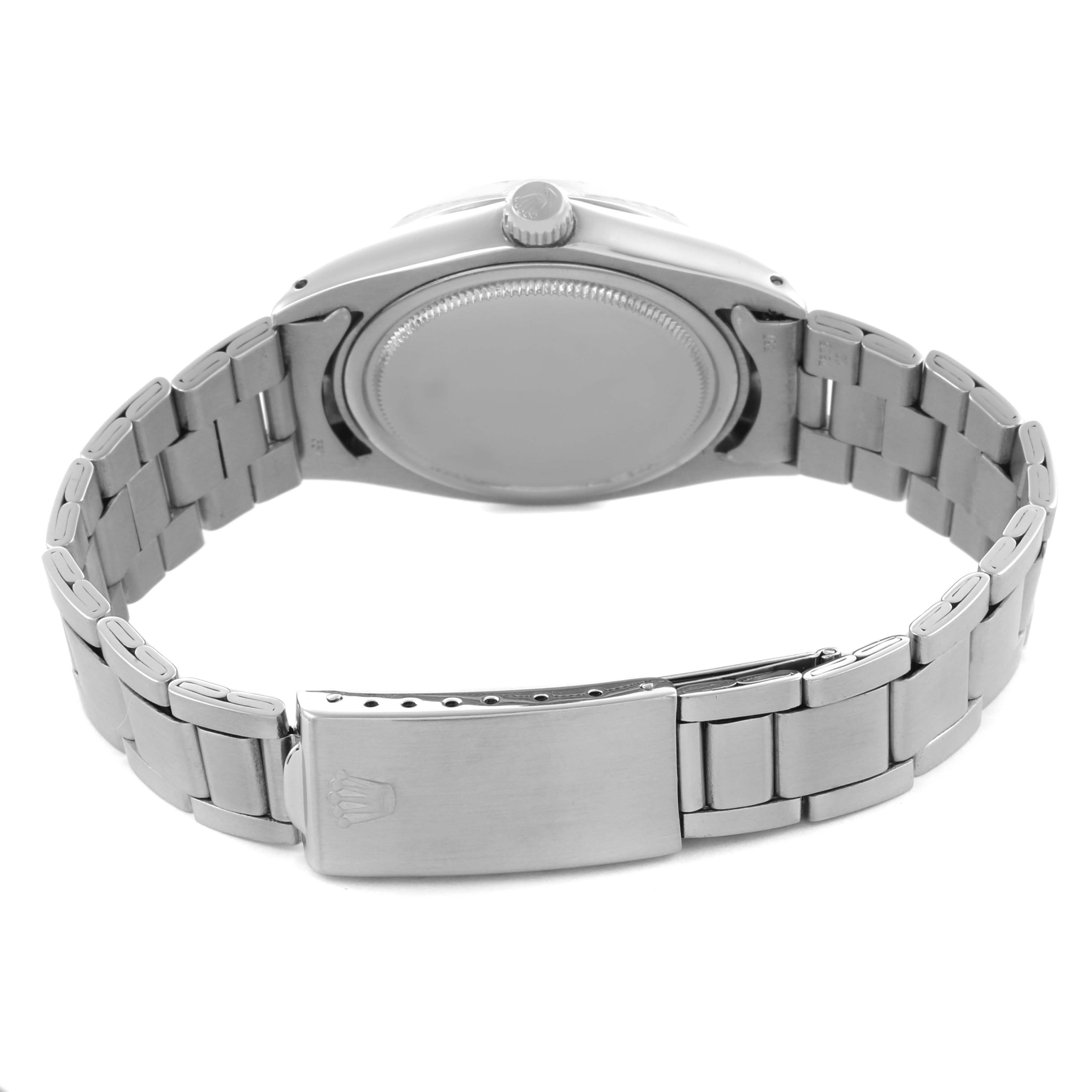 The image shows the back of the Rolex Date 6694 Men's Stainless Steel Silver Dial 6694 Men's Stainless Steel Silver Dial model watch, highlighting the case back, bracelet, and clasp.