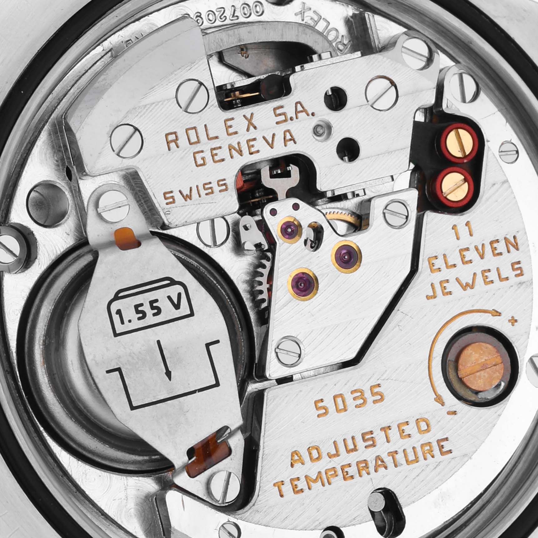 The image shows the movement of the Rolex Oysterquartz 17013 Men's Steel and Gold (two tone) White Dial 17013 Men's Steel and Gold (two tone) White Dial watch, highlighting the battery and mechanical components.