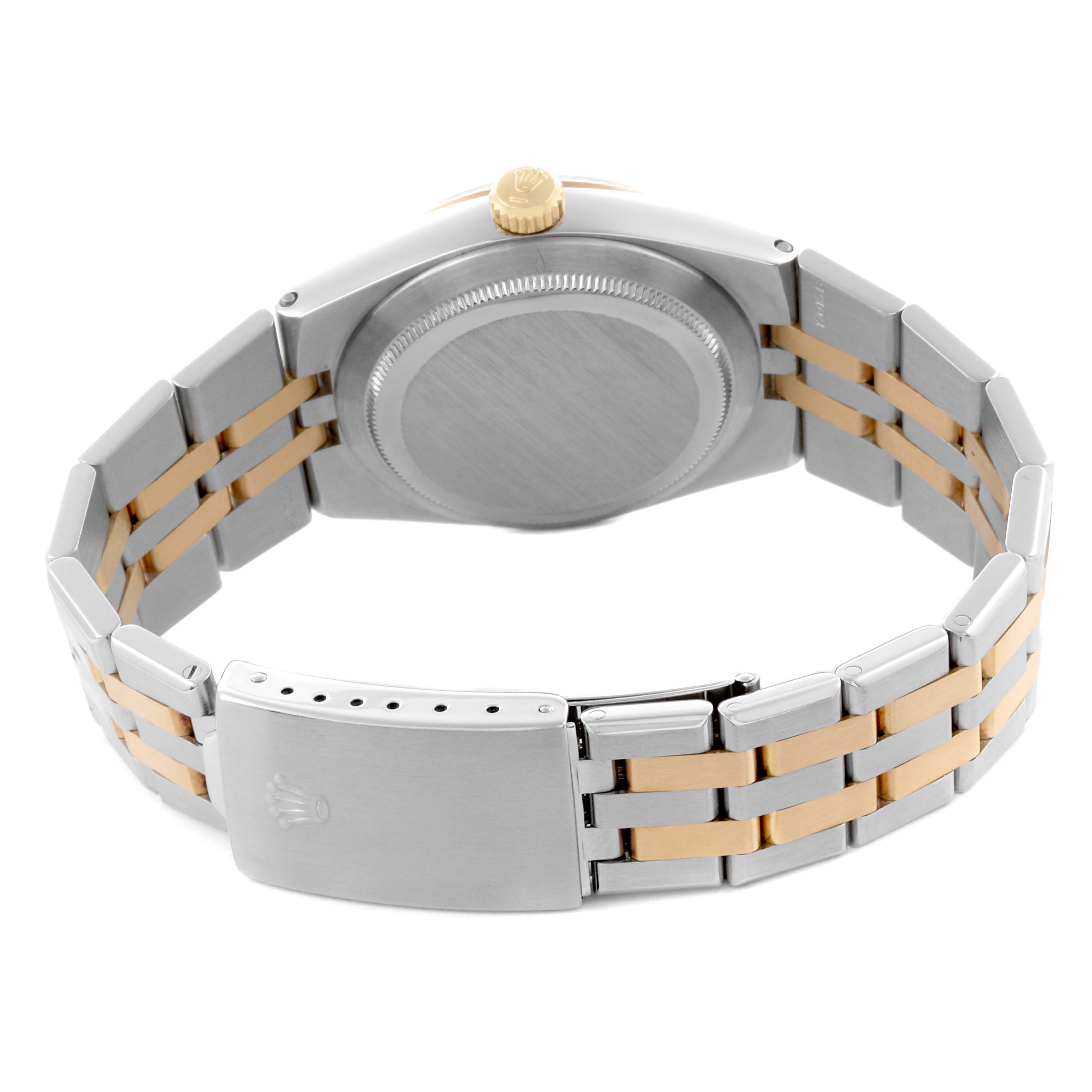 The image shows the back and bracelet of a Rolex Oysterquartz 17013 Men's Steel and Gold (two tone) White Dial 17013 Men's Steel and Gold (two tone) White Dial, highlighting the case, crown, and clasp.