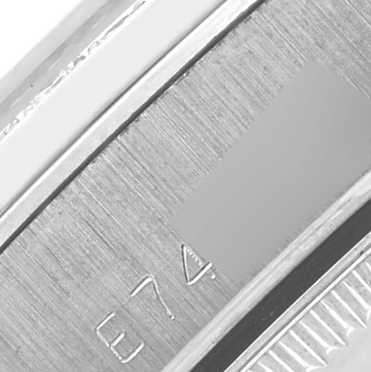 This image shows a close-up of the inner case or bracelet of the Rolex President 68289 Women's White Gold Silver Dial 68289 Women's White Gold Silver Dial model, highlighting the engraved details.