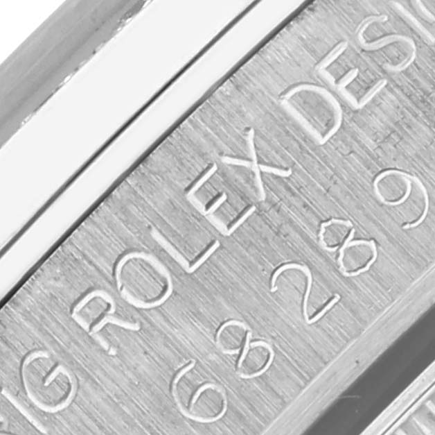 The image shows the inner side of the caseback of a Rolex President 68289 Women's White Gold Silver Dial 68289 Women's White Gold Silver Dial model, highlighting the engraved model number and branding.