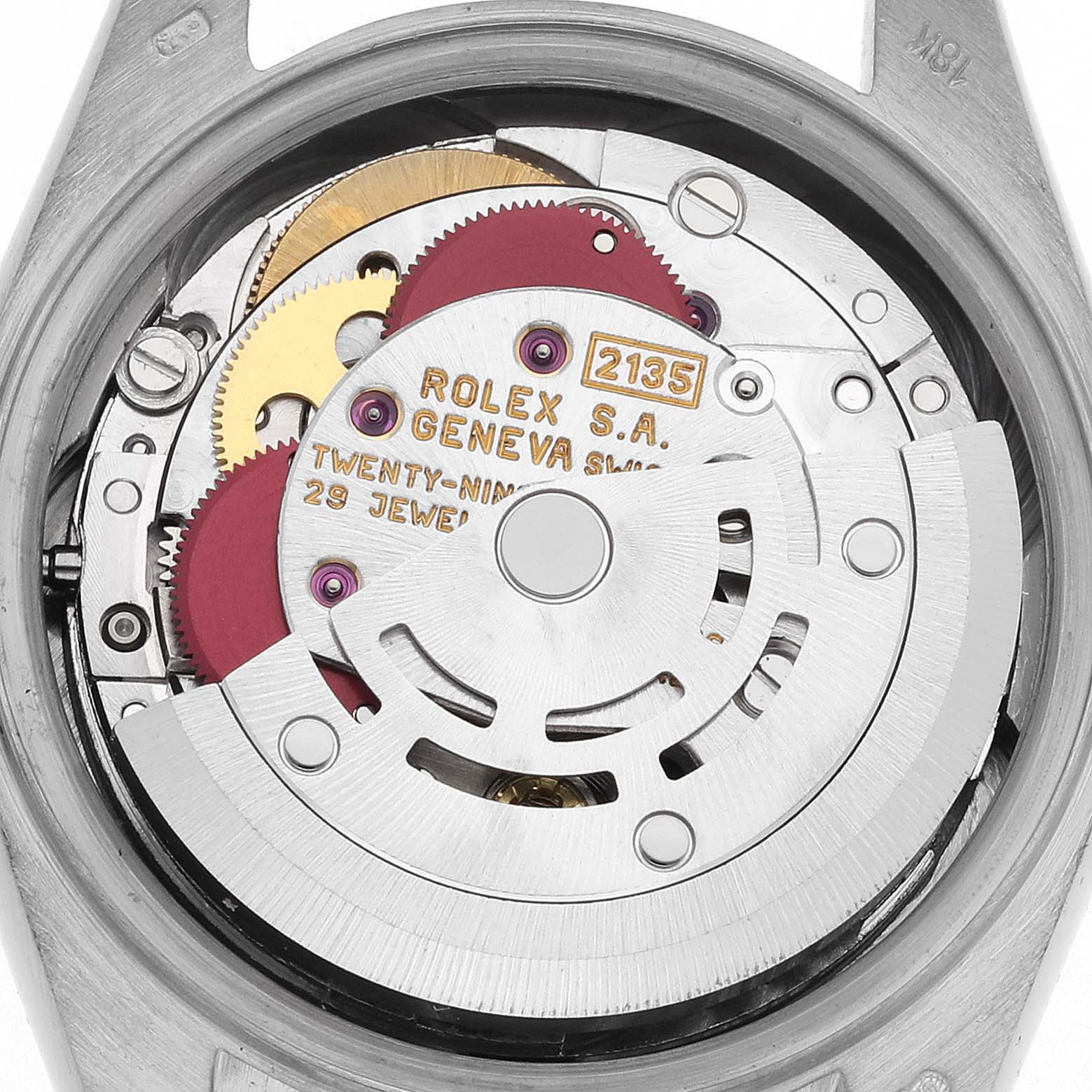 The image shows the Rolex Pearlmaster's movement, highlighting gears and jewel settings from an internal angle.