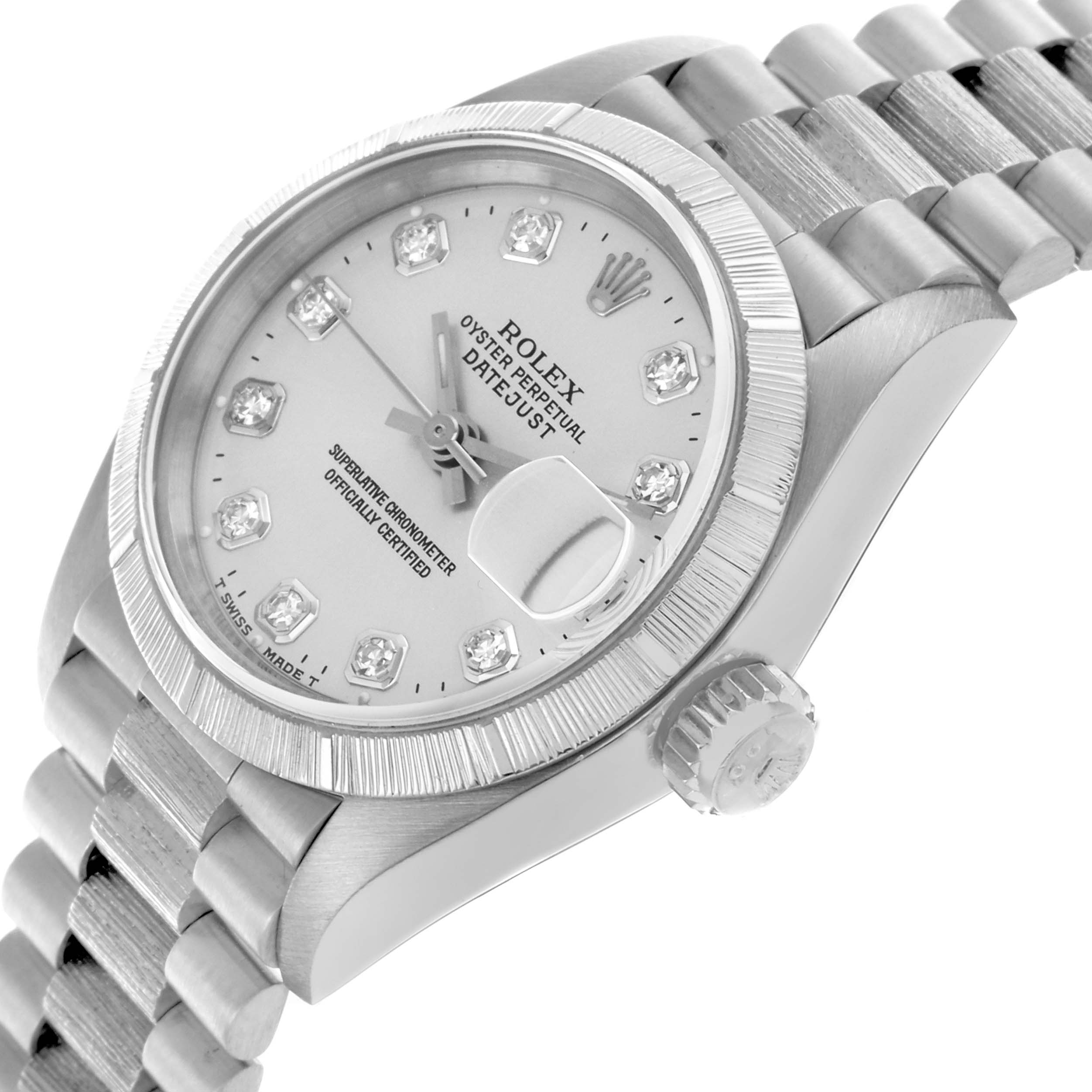 The Rolex Pearlmaster watch is shown at a tilted angle, highlighting the face, bezel, and part of the bracelet.