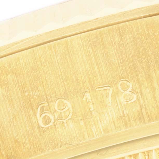 The image shows a close-up of the engraved numbers on the band or clasp of a Rolex President 69178 Women's Yellow Gold Champagne Dial 69178 Women's Yellow Gold Champagne Dial model.