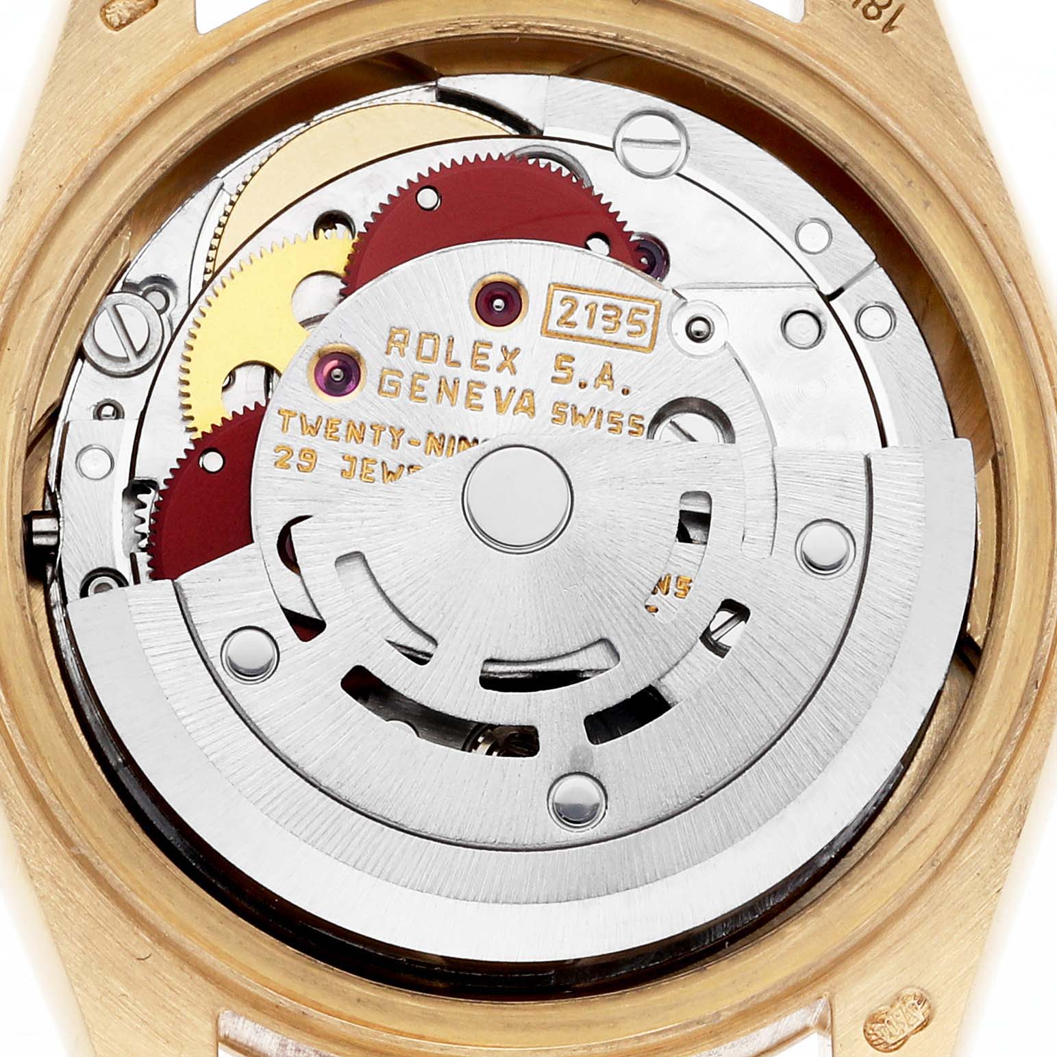 The image shows the internal movement mechanism of a Rolex President 69178 Women's Yellow Gold Champagne Dial 69178 Women's Yellow Gold Champagne Dial watch from the back, highlighting gears and fine detailing.