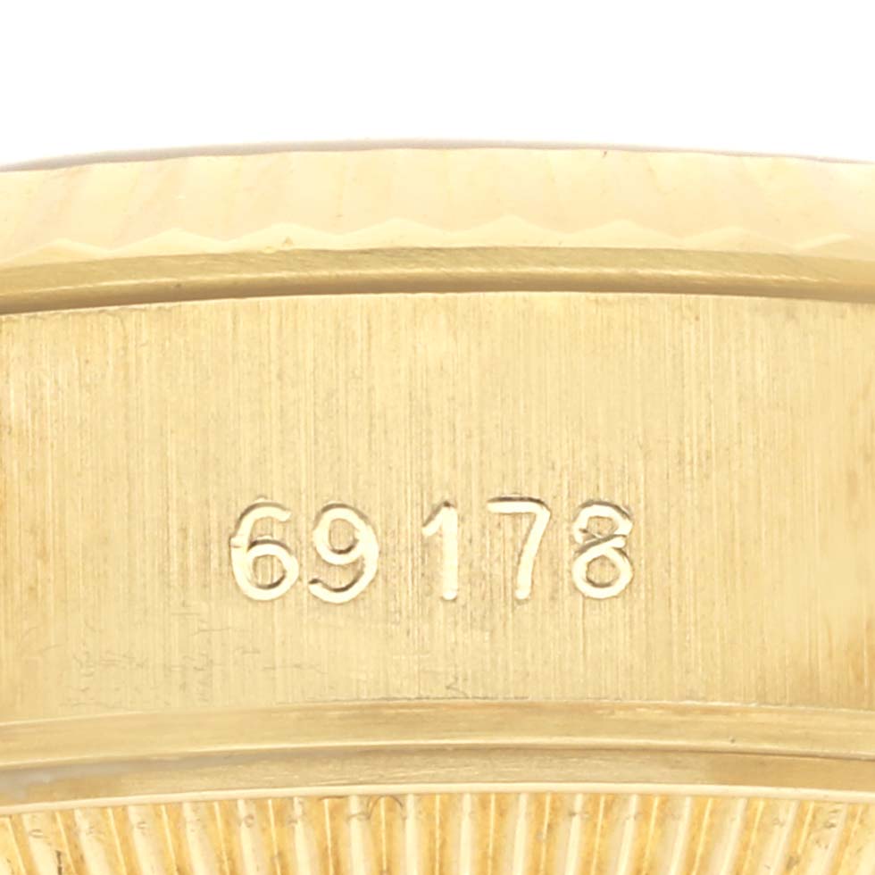 The image shows a close-up of the model number engraving on the side of a Rolex President 69178 Women's Yellow Gold Champagne Dial 69178 Women's Yellow Gold Champagne Dial watch case.