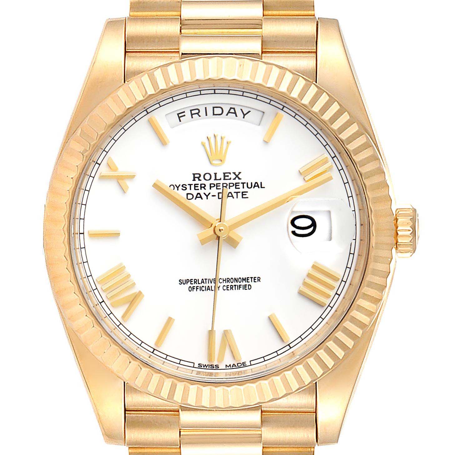 This President model Rolex watch is shown from a top-down angle, displaying the face, bracelet, crown, and date window.